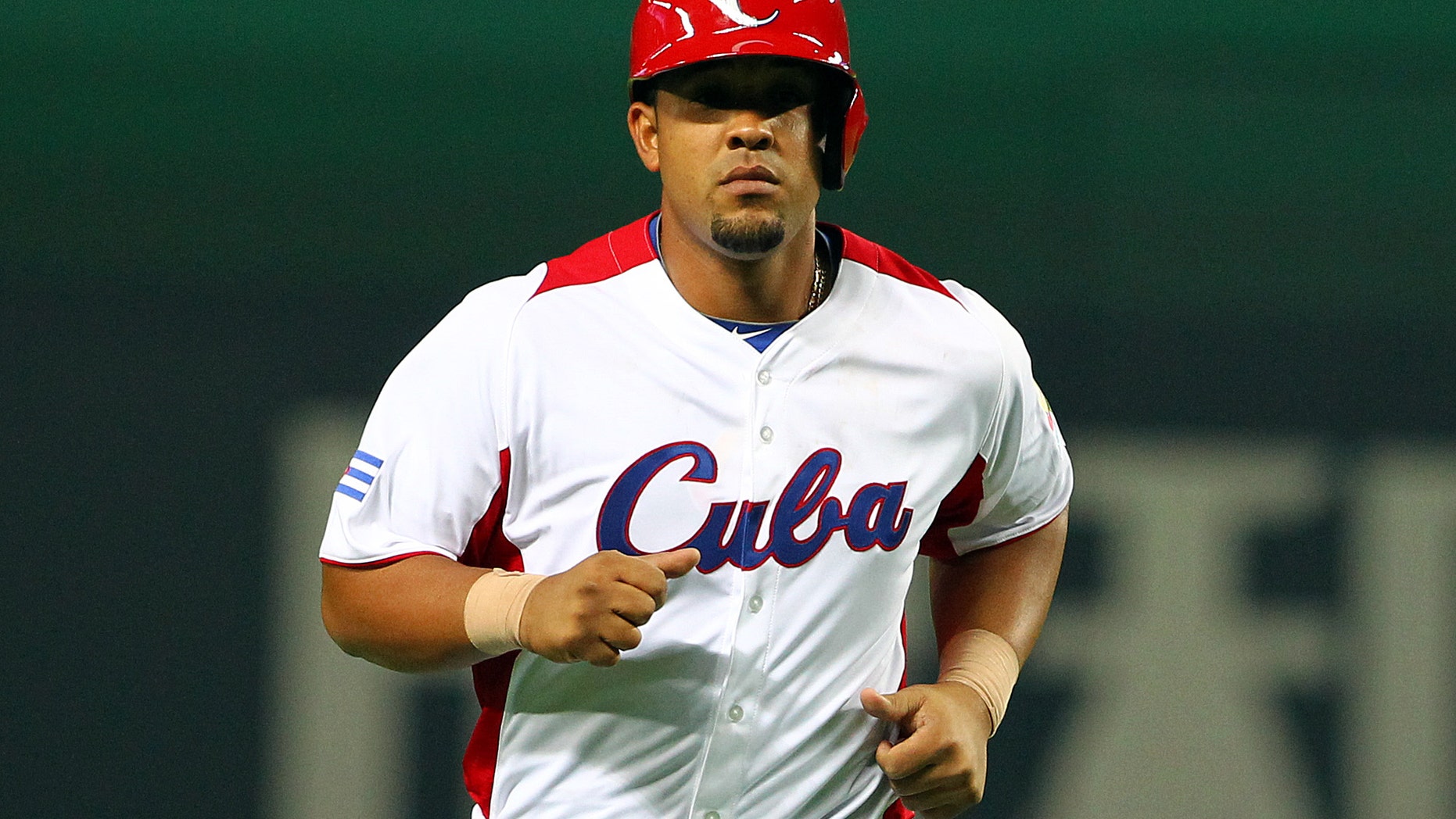 FUKUOKA, JAPAN - MARCH 04: Infielder Jose Abreu #79 of Cuba celebrates after scoring a hit grand slam homer in the bottom half of the fifth inning during the World Baseball Classic First Round Group A game between Cuba and China at Fukuoka Yahoo! Japan Dome on March 4, 2013 in Fukuoka, Japan. (Photo by Koji Watanabe/Getty Images)