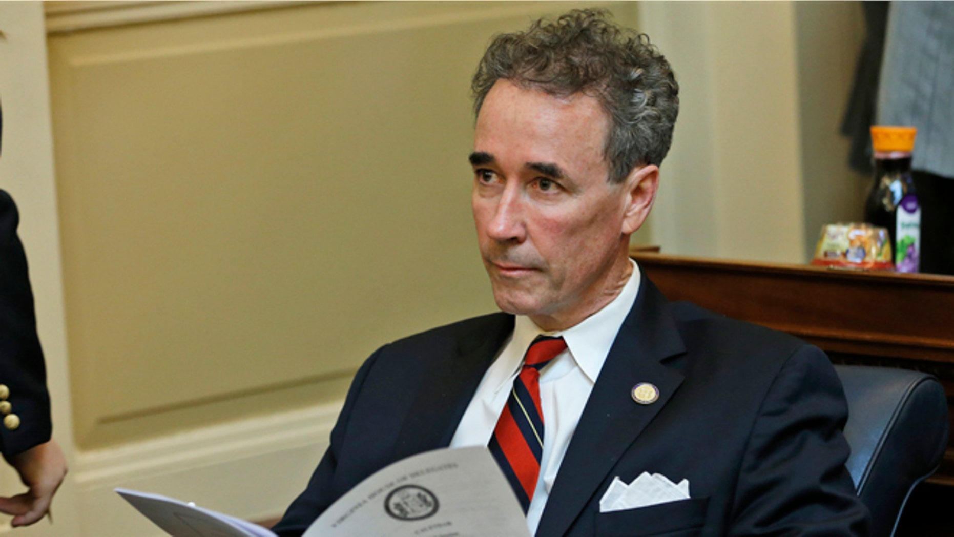 Del. Joe Morrissey, I-Henrico, looks over the calendar during the House session at the Capitol in Richmond, Va., Wednesday, Jan. 21, 2015.