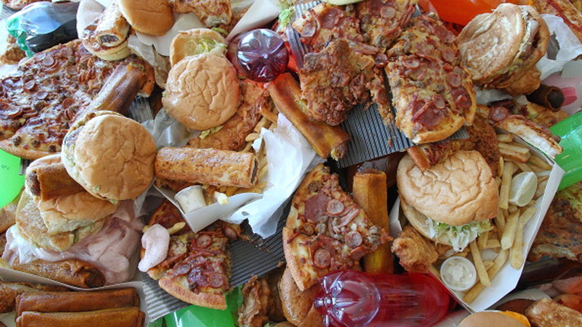 MELBOURNE, AUSTRALIA - MARCH 06: Junk food sits on a table as British Celebrity Chef Jamie Oliver announces a partnership to attack state-wide obesity on March 6, 2012 in Melbourne, Australia. The Victorian Government and the Good Foundation will pledge together over AUD5 million to bring Oliver's 'Ministry of Food' to the state to help teach cooking techniques and nutrition to participants and help combat obesity as part of the Victorian Healthy Eating Enterprise. (Photo by Scott Barbour/Getty Images)