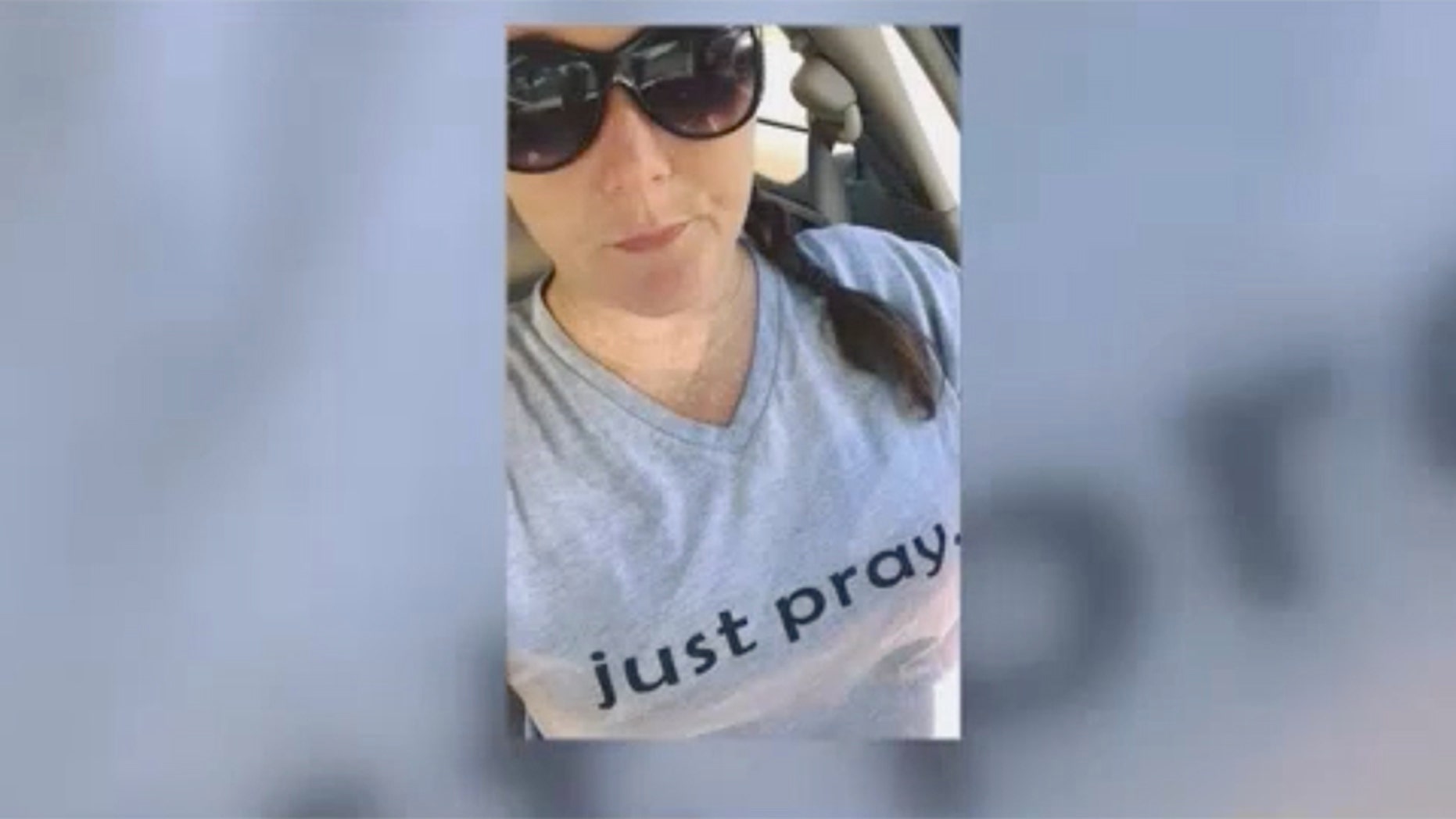 Chris Burrell, a teacher, said she was told to change her shirt that said, "just pray."