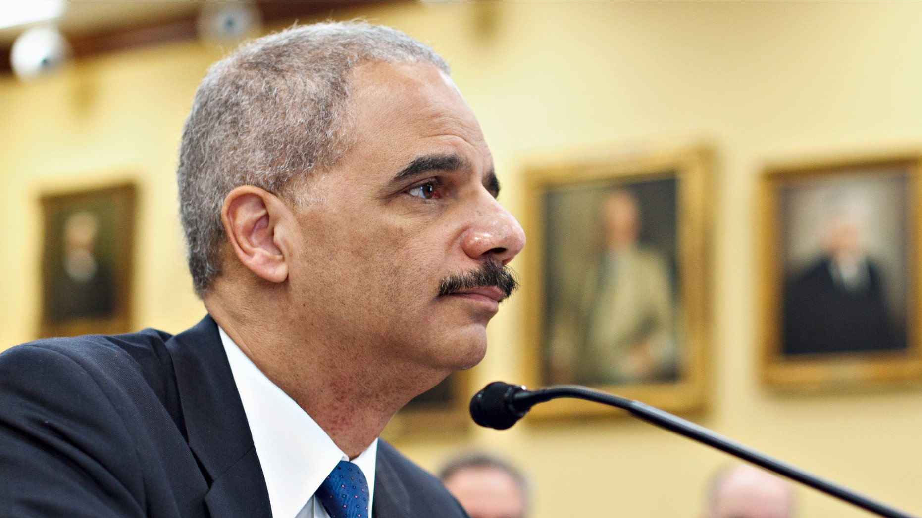 Attorney General Eric Holder testifies on Capitol Hill in Washington, Tuesday, Feb. 28, 2012, before a House Appropriations subcommittee hearing on the Justice Department's fiscal 2013 budget. (AP Photo/J. Scott Applewhite)