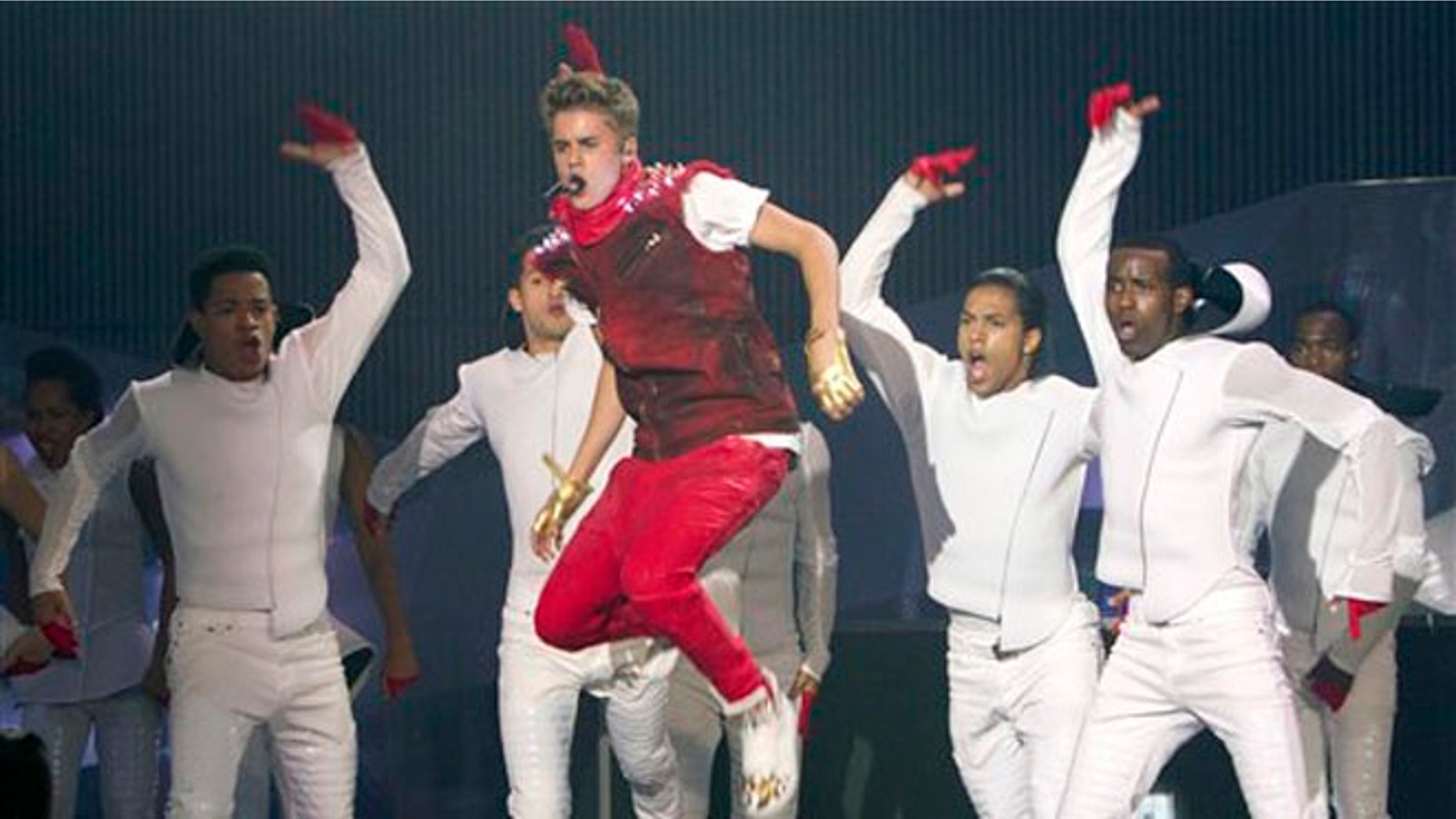 FILE - This June 17, 2012 file photo shows singer Justin Bieber performing during the 2012 Much Music Video Awards in Toronto. Bieber’s “Believe” is the year’s top-selling debut. Nielsen SoundScan reports sales of 374,000 copies following its release last week, giving the 18-year-old Canadian pop singer the fourth No. 1 album and the best sales week of his young career. “Believe” also debuted at No. 1 in 29 other countries. (AP Photo/The Canadian Press, Chris Young, file)