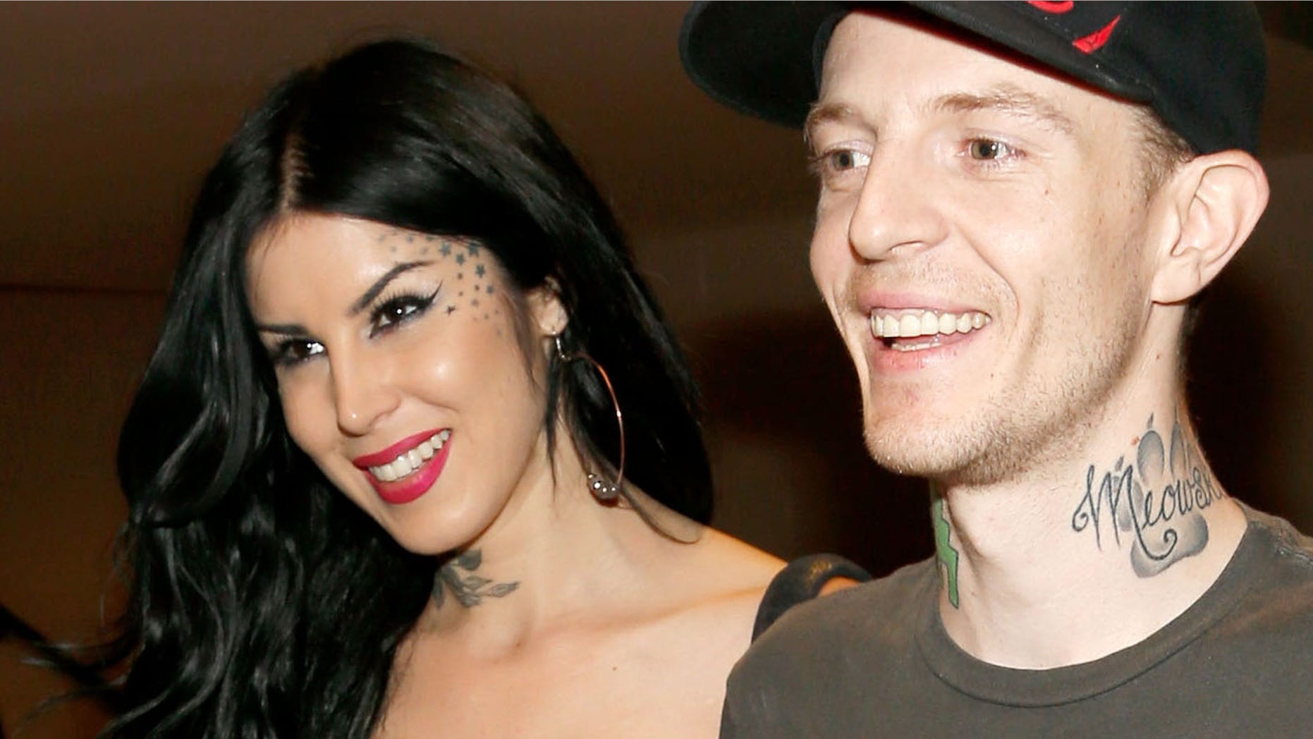 LAS VEGAS, NV - SEPTEMBER 22: (L-R) TV personality Kat Von D (L) and recording artist Joel Zimmerman aka Deadmau5 walk backstage during the 2012 iHeartRadio Music Festival at the MGM Grand Garden Arena on September 22, 2012 in Las Vegas, Nevada. (Photo by Isaac Brekken/Getty Images for Clear Channel)