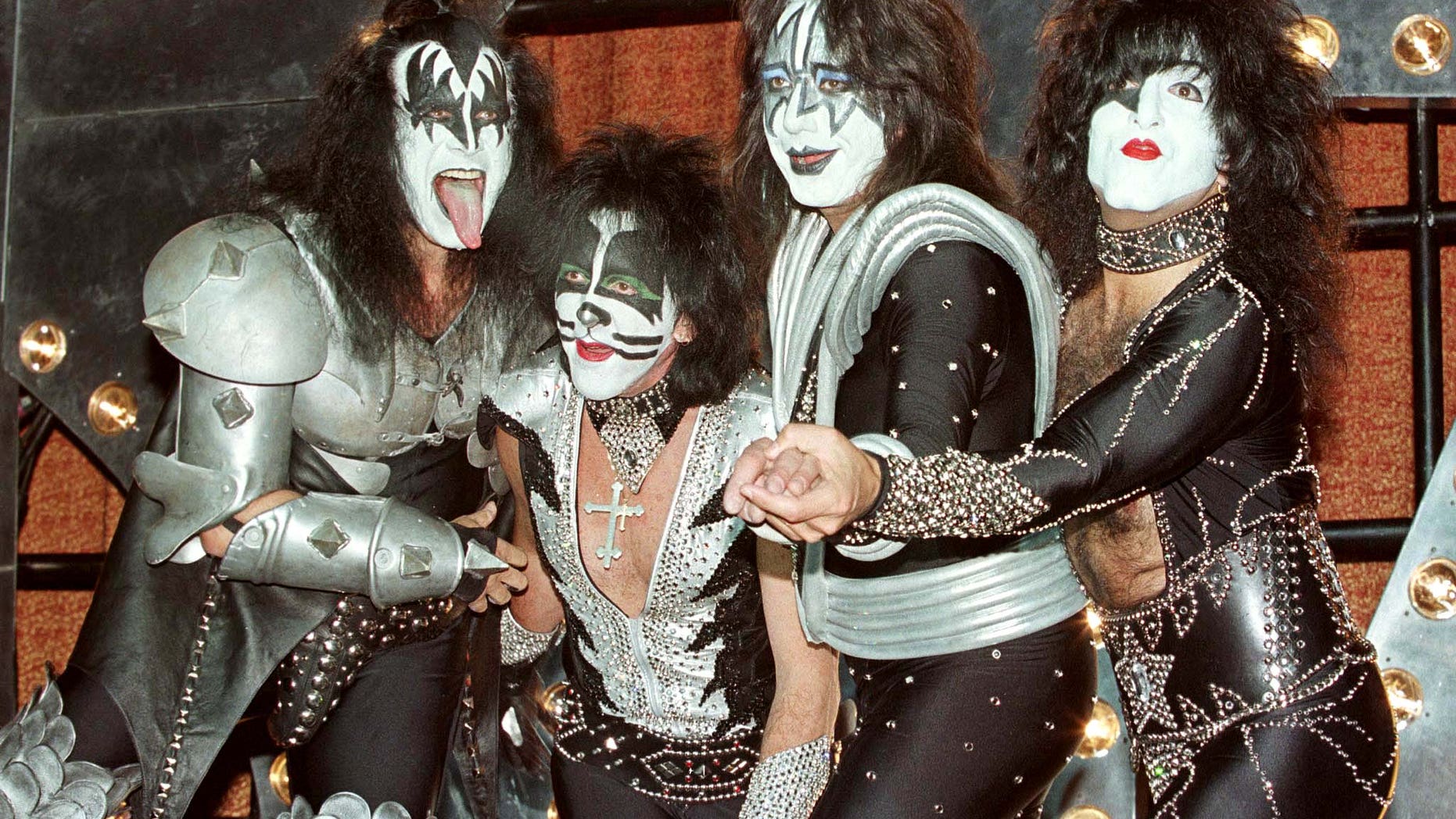 September 22, 1998. The band KISS pose during a press conference to promote their new album, "Psycho Circus" at Mann's Chinese Theater in Hollywood. From L to R, Gene Simmons, Peter Criss, Ace Frehley and Paul Stanley.