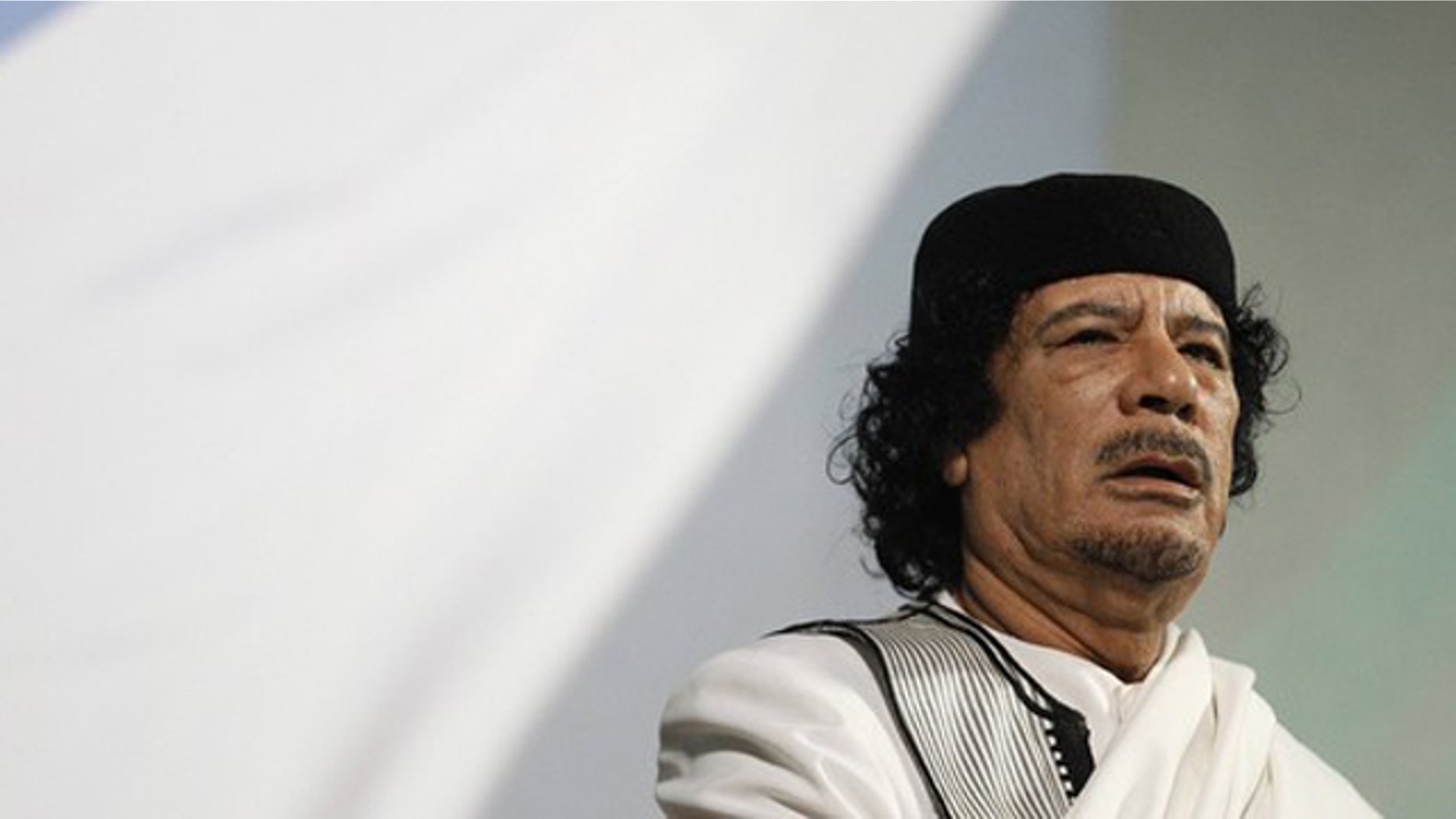 FILE: Libyan leader Muammar al-Qaddafi gives a speech in Rome August 30, 2010.