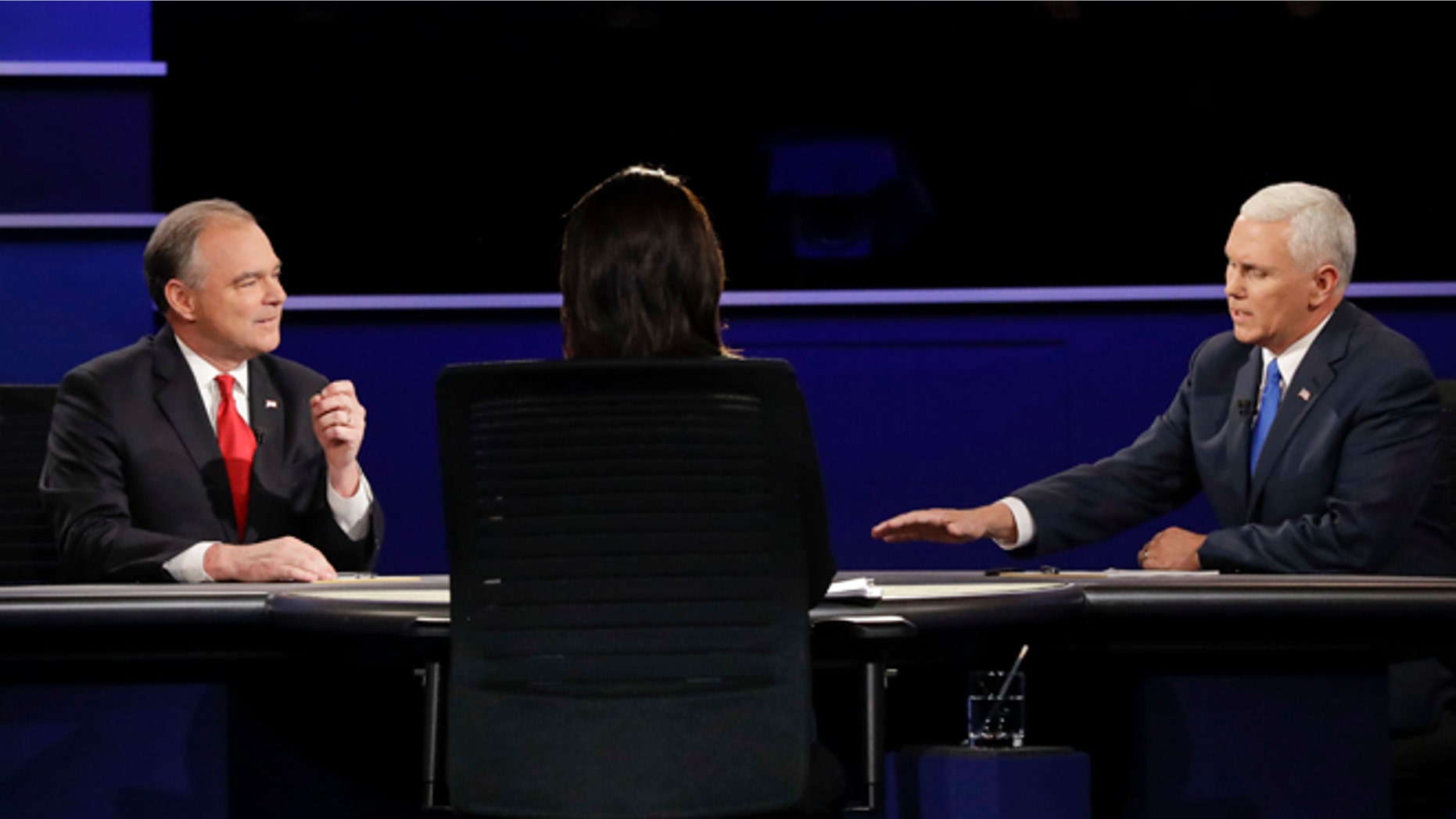 Republican vice-presidential nominee Gov. Mike Pence, right, and Democratic vice-presidential nominee Sen. Tim Kaine answer a question during the vice-presidential debate at Longwood University in Farmville, Va., Tuesday, Oct. 4, 2016. (AP Photo/David Goldman)
