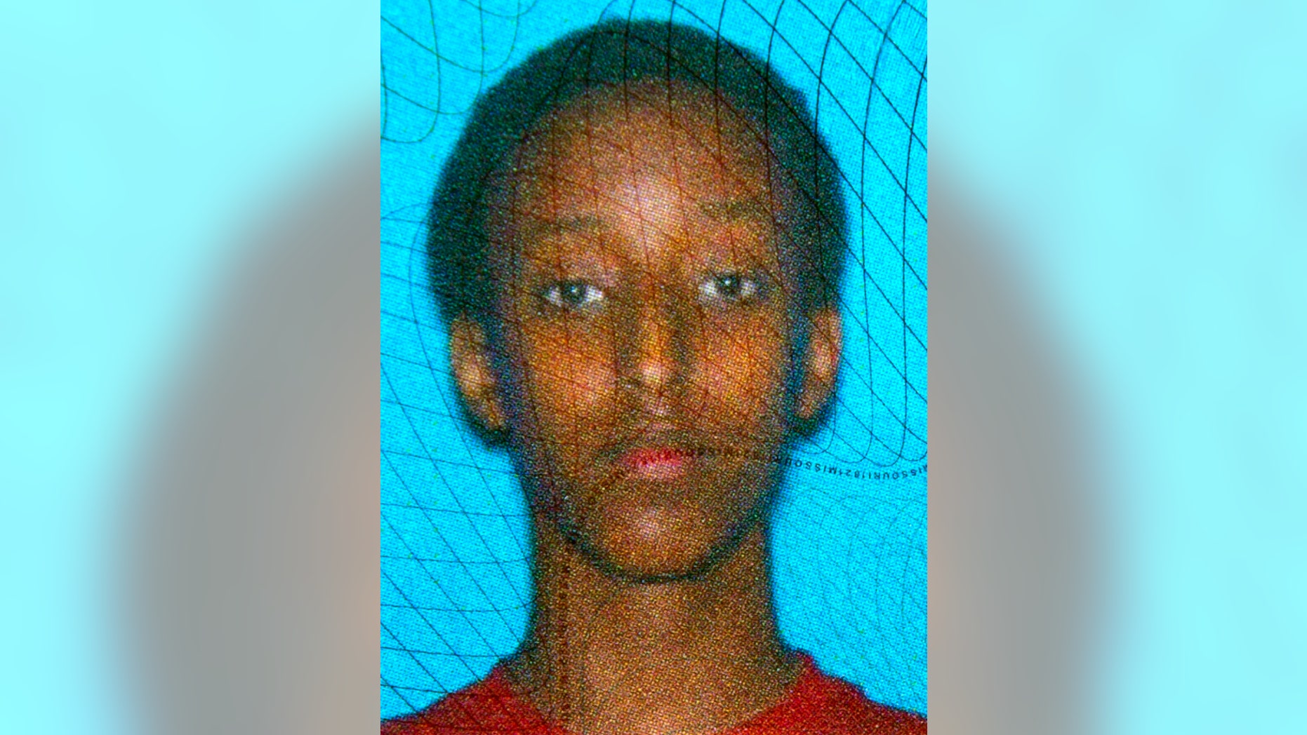 File-This undated Department of Motor Vehicles photo courtesy the family shows Abdisamad Sheikh-Hussein. The man charged with deliberately running down the Muslim teenager outside a Somali center has made his first court appearance. Thirty-four-year-old Ahmed Aden, of Kansas City, appeared Monday, Dec. 8, 2014, in Jackson County Circuit Court where he is charged with first-degree murder, armed criminal action, leaving the scene of an accident and unlawful use of a weapon. (AP Photo/File)