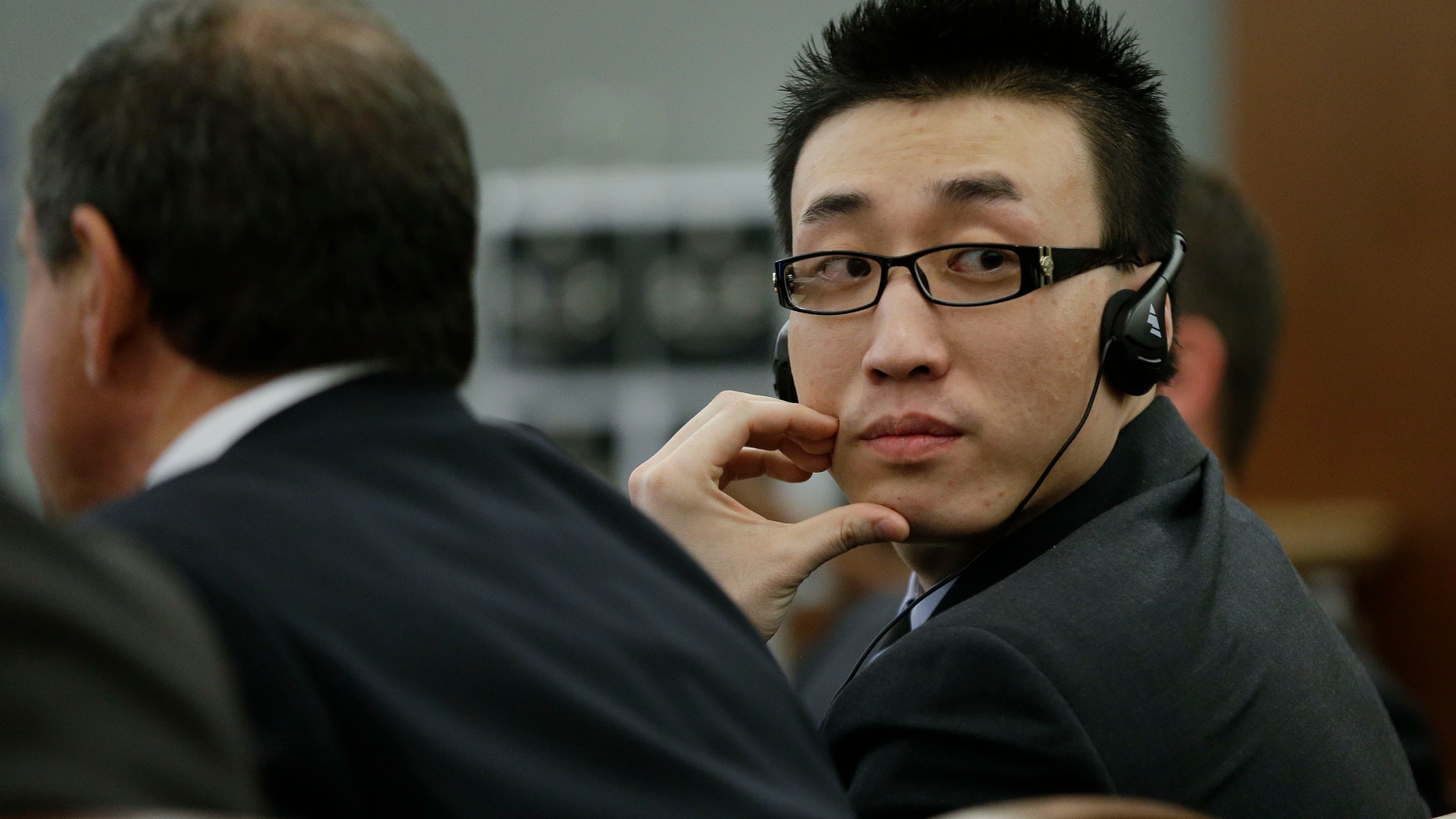 Nov. 28, 2012: Xiao Ye Bai listens in Clark County Court as attorneys for the defense speak during arguments in his sentencing in this file photo taken in Las Vegas.