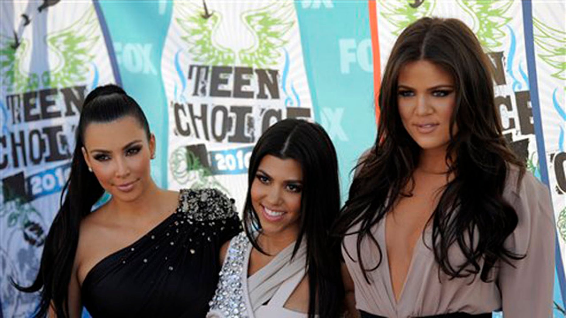 Aug. 8, 2010: From left, Kim Kardashian, Kourtney Kardashian and Khloe Kardashian arrive at the Teen Choice Awards in Universal City, Calif.