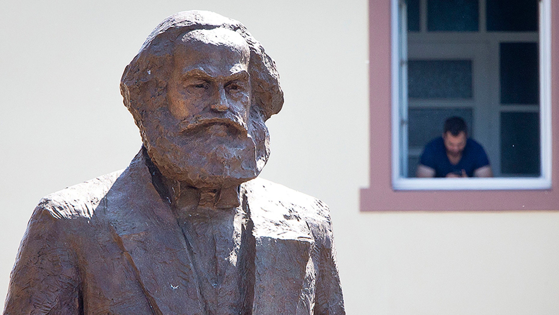 A bronze statue showing German philosopher Karl Marx. Poland’s interior minister apologized after police entered a conference devoted to Karl Marx to check if anyone was propagating “totalitarianism” or engaging in “anti-national activity.”