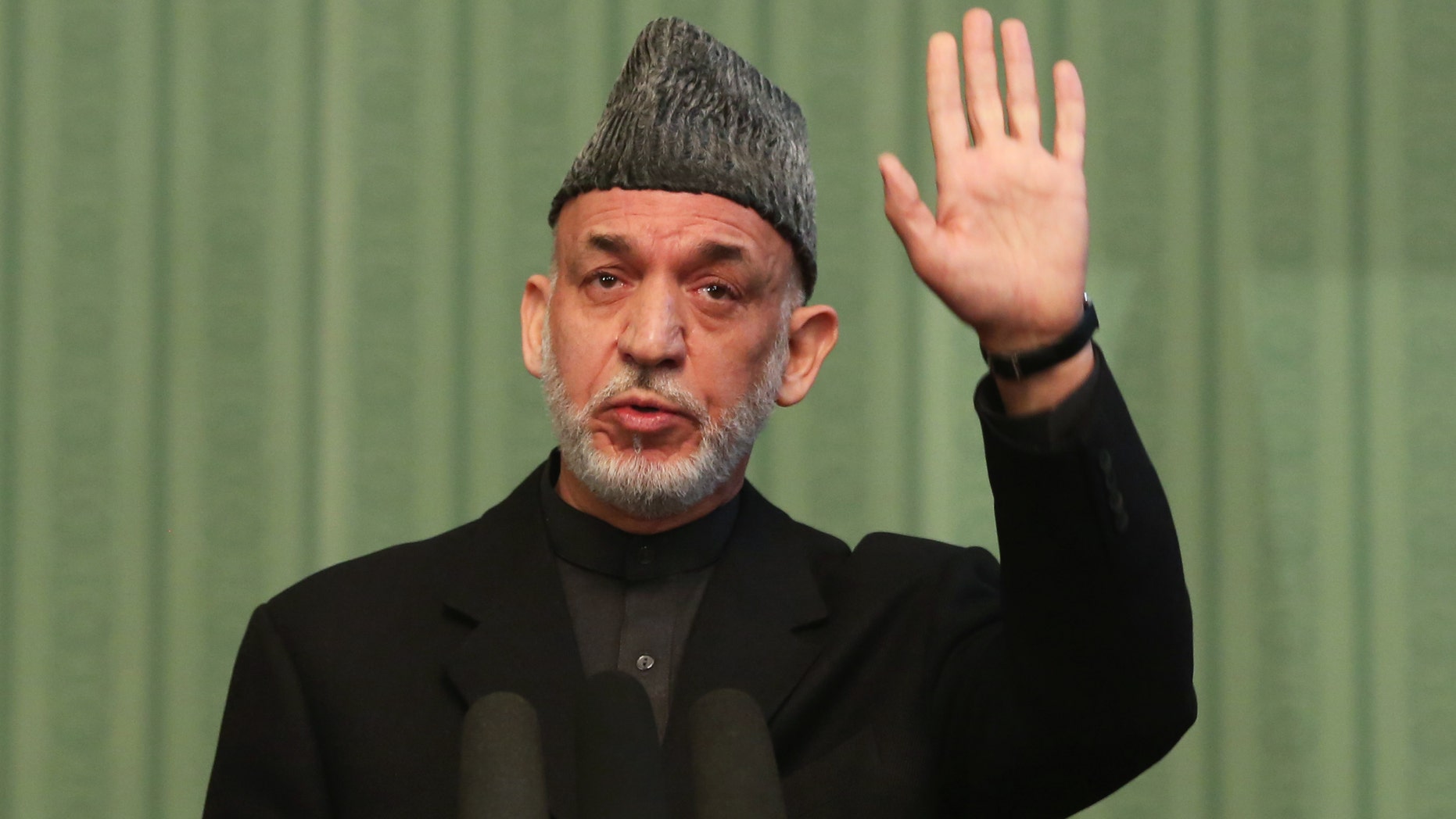 Jan. 25, 2014: Afghan President Hamid Karzai speaks during a press conference at the presidential palace in Kabul, Afghanistan.