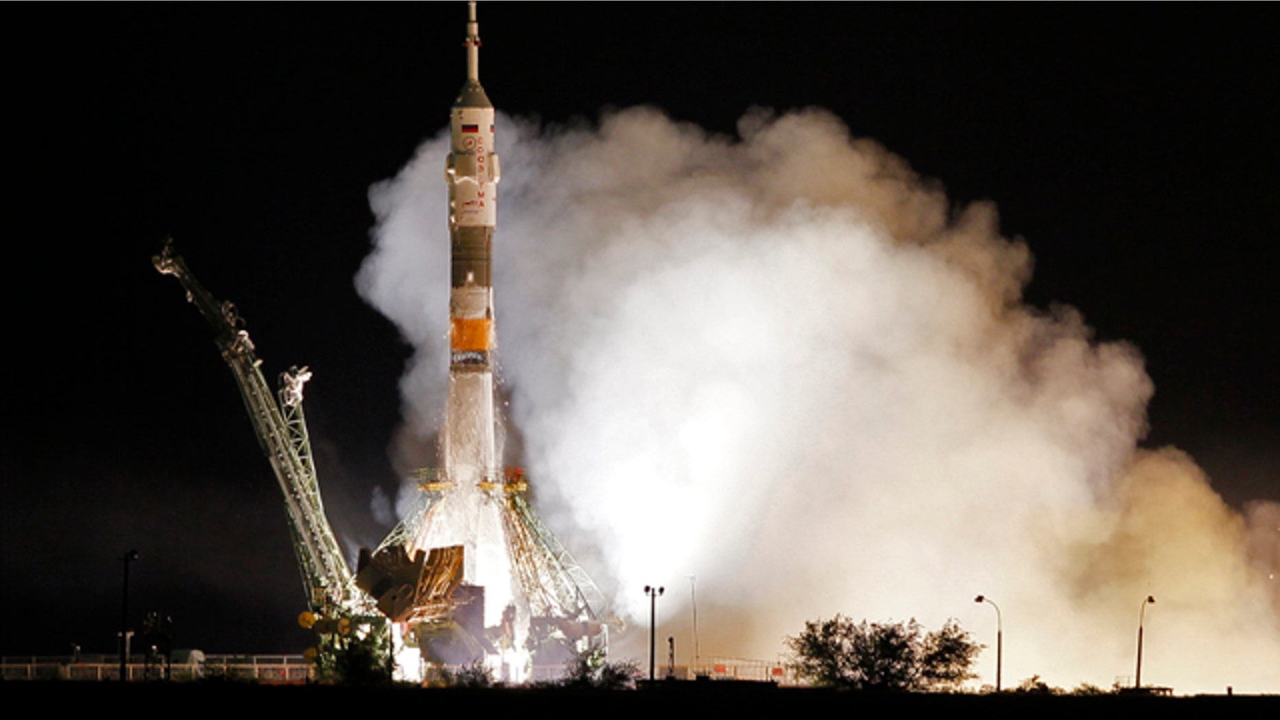 The Soyuz-FG rocket booster with Soyuz TMA-02M space ship carrying a new crew to the International Space Station, ISS, blasts off from the Russian leased Baikonur cosmodrome, Kazakhstan, Wednesday, June 8, 2011. The Russian rocket carries U.S. astronaut Michael Fossum, Russian cosmonaut Sergey Volkov and Japanese astronaut Satoshi Furukawa.
