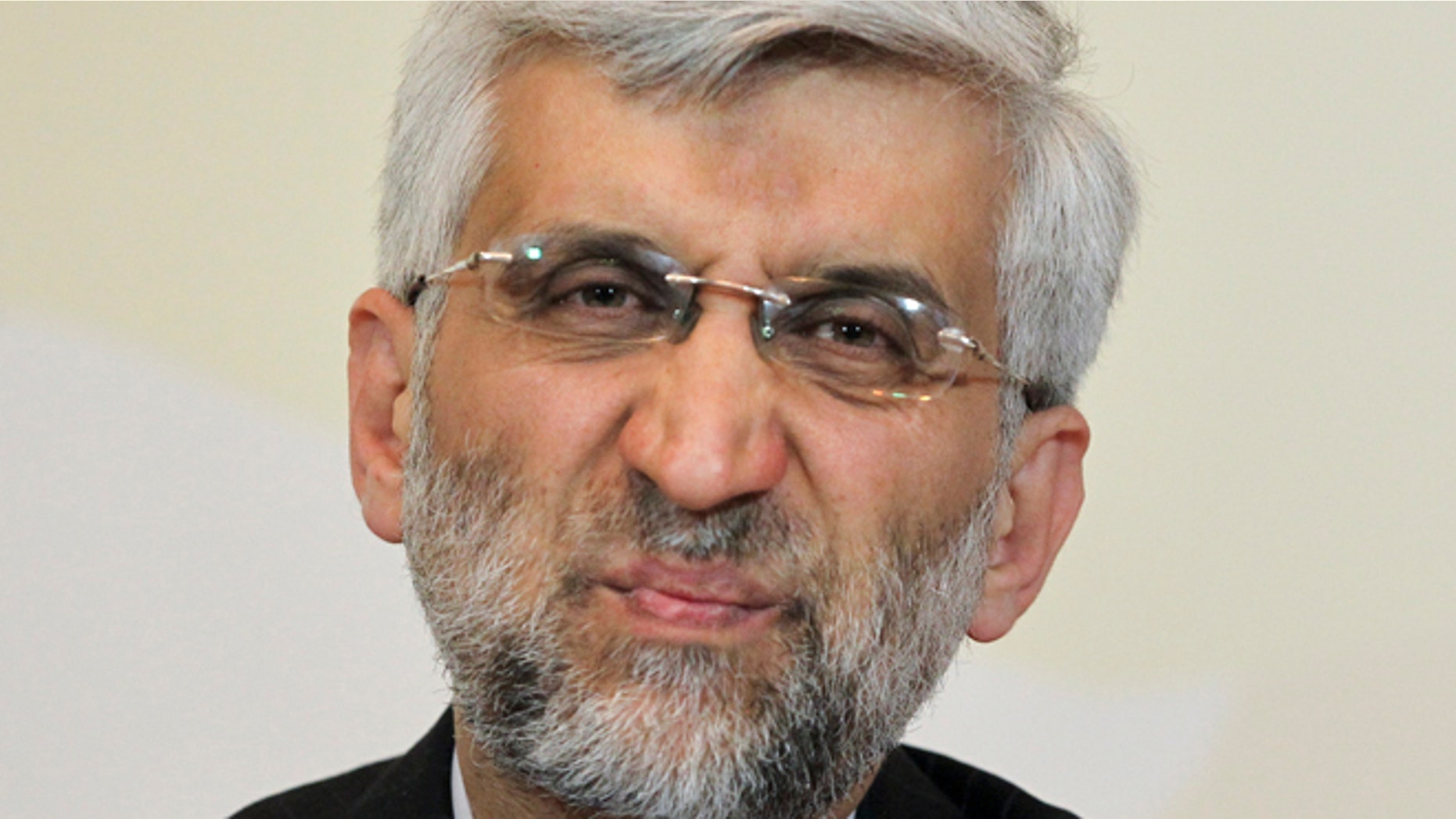 April 6, 2013: Secretary of Iran's Supreme National Security Council, Saeed Jalili grimaces while listening to a question during his news conference after the high-level talks between world powers and Iranian officials in Almaty, Kazakhstan.