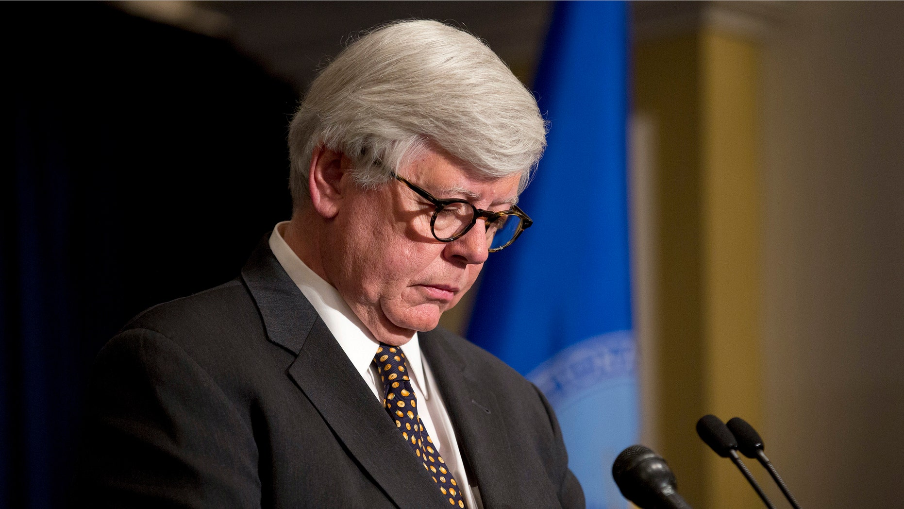 FILE: December 21, 2012: National Rifle Association President David Keene leads a moment of silence for victims of the Sandy Hook Elementary School shootings, before a news conference in Washington, D.C.