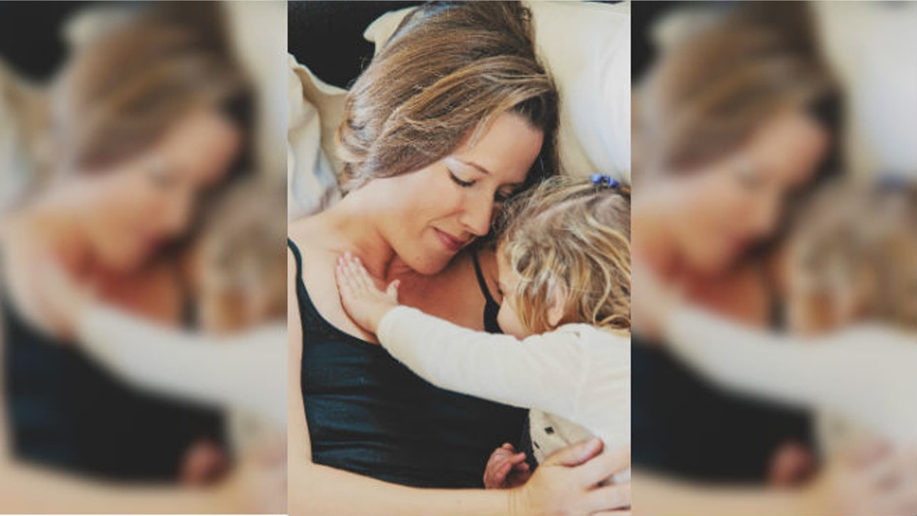 Keenaghan's daughter singing to her after surgery. (image: Denise Conrad)