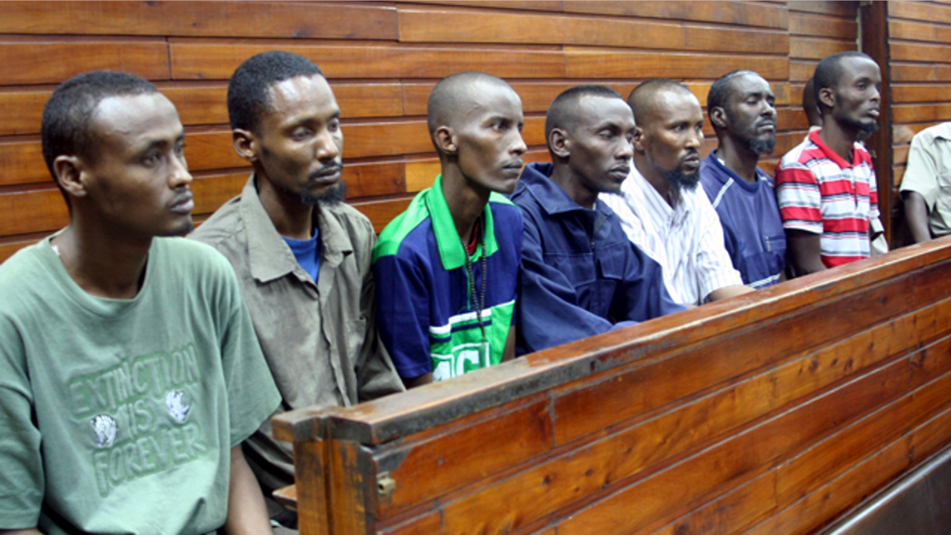 September 6: The seven suspected Somali pirates sit in the dock at the Mombasa Law courts in Kenya, as the Mombasa Chief Magistrate Rosemelle Motoka read her judgement. (AP)