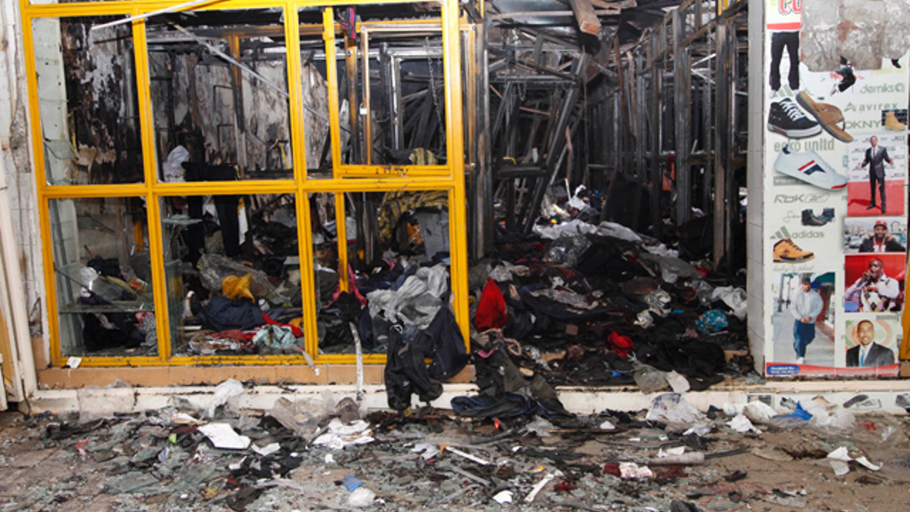 May 29: Destroyed shop after an explosion in downtown Nairobi. The explosion ripped through a building, injuring at least 33 people, including a woman who blamed the blast on a 'bearded man' who left behind a bag shortly before the detonation.