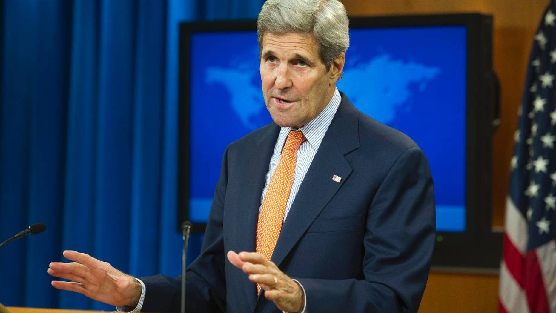 Secretary of State John Kerry speaks at the State Department in Washington, Thursday, June 25, 2015, to release it's annual human rights reports. The Obama administration has once again identified Iran and Cuba as serial human rights abusers even as it accelerates attempts to improve relations with both countries. (AP Photo/Cliff Owen)