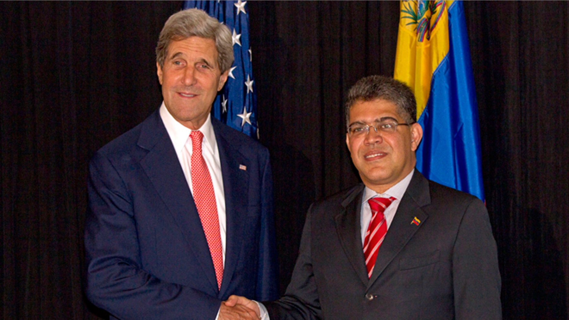 Secretary of State John Kerry and Venezuelan Foreign Minister Elias Jose Jaua during a meeting of AOS General Assembly in Antigua, Guatemala, Wednesday, June 5, 2013.