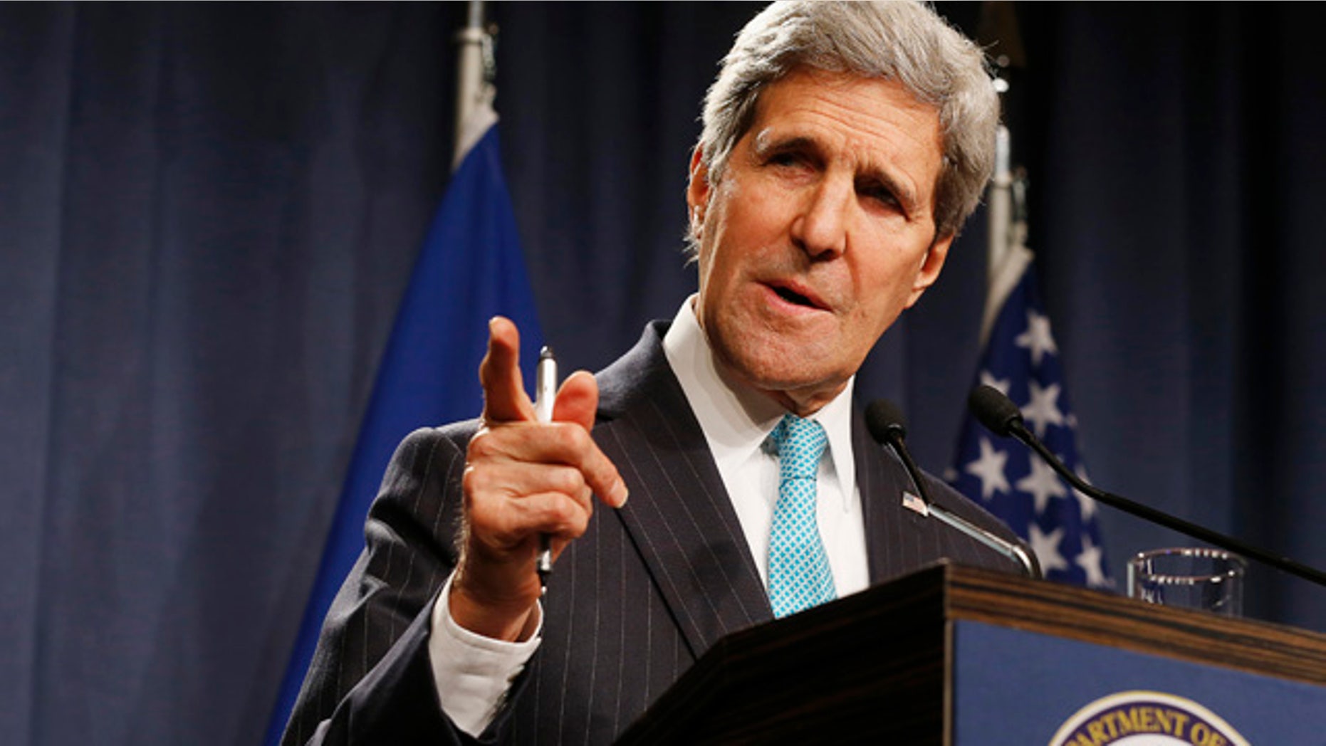 April 17, 2014: Secretary of State John Kerry speaks to the media after attending a quadrilateral meeting.