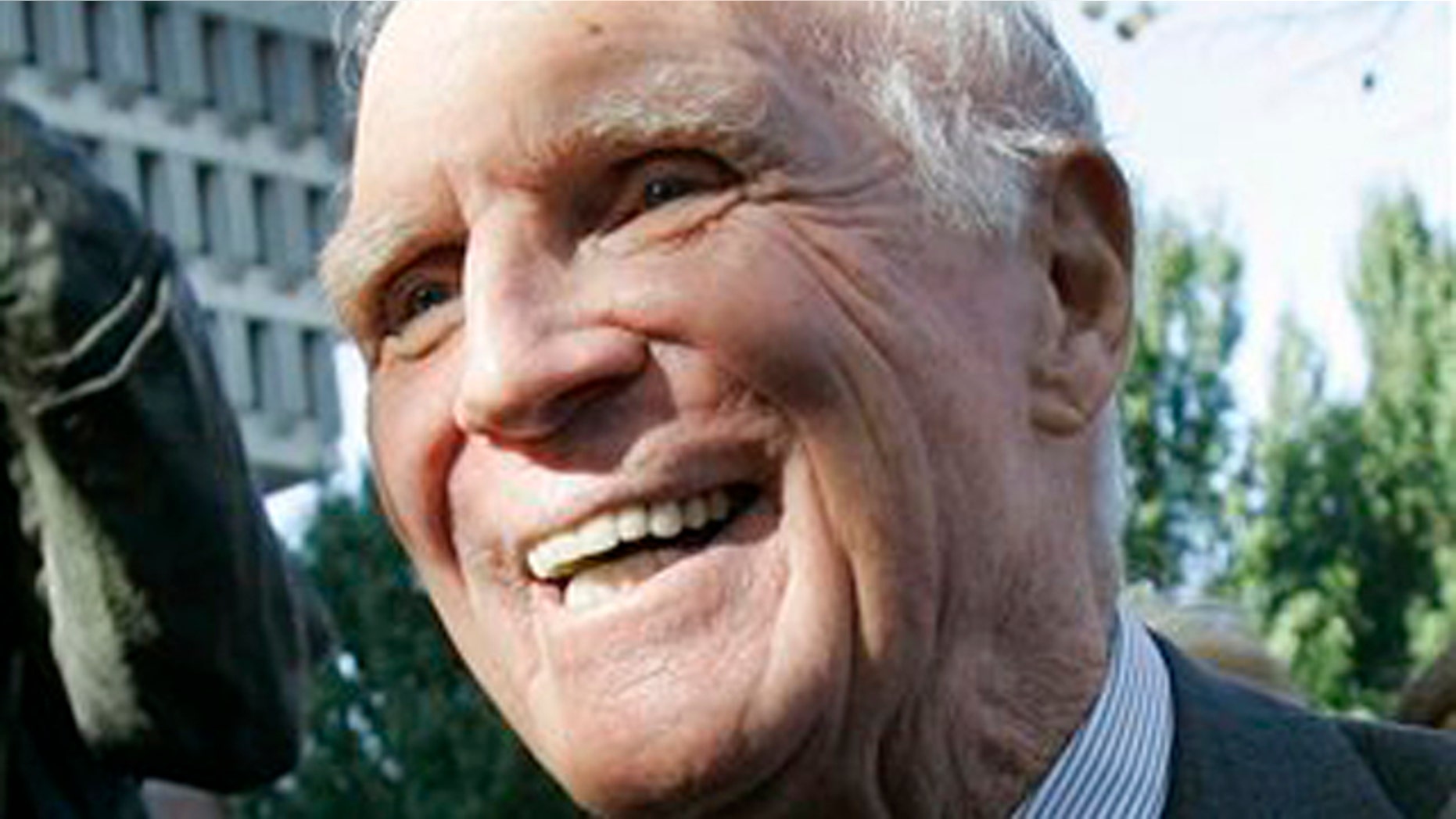 This Nov. 1, 2006 file photograph shows former Boston Mayor Kevin White outside Faneuil Hall in Boston. White, who led the city for 16 years including racially turbulent times in the 1970s, died Friday. He was 82.