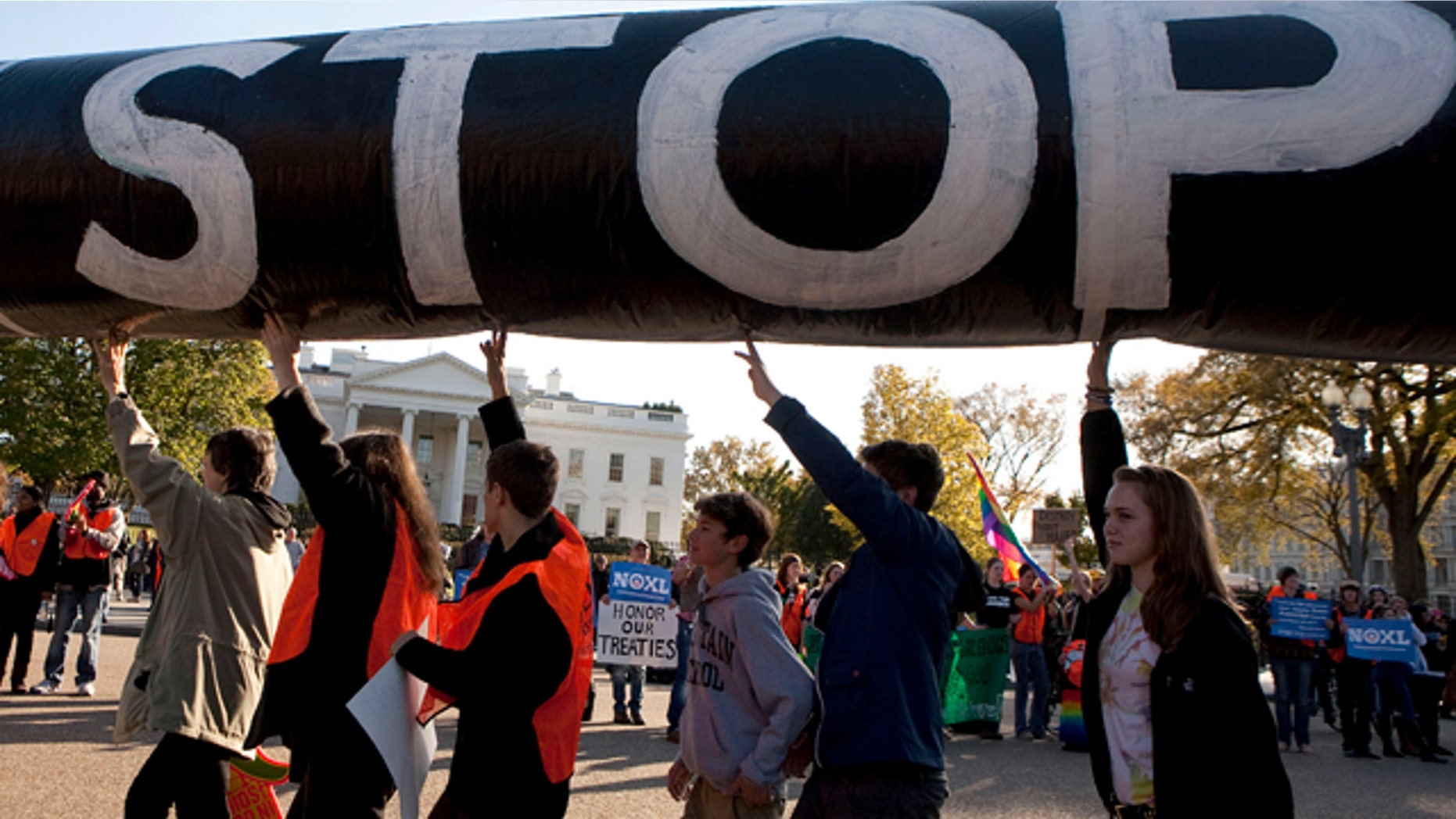 FILE: Nov. 6, 2011: Demonstrators call for the cancellation of the Keystone XL pipeline a rally in front of the White House, in Washington, D.C.