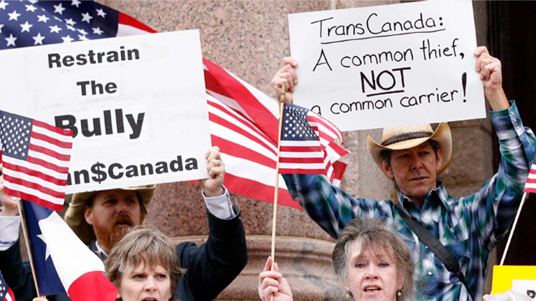 FILE: February 17, 2012: Protestors rallied in front of the Lamar County courthouse before a hearing on the Keystone pipeline in Paris, Texas.