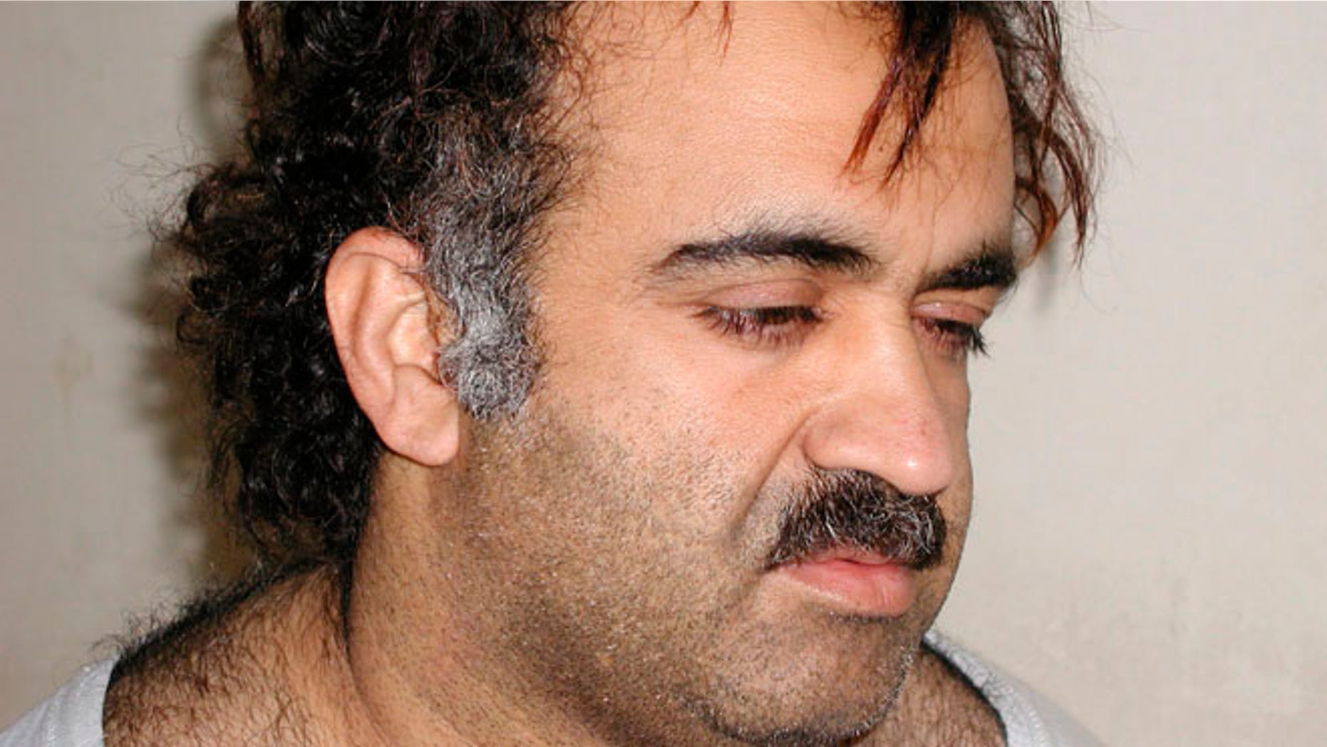 Khalid Sheikh Mohammed is shown in this file photograph during his arrest on March 1, 2003.