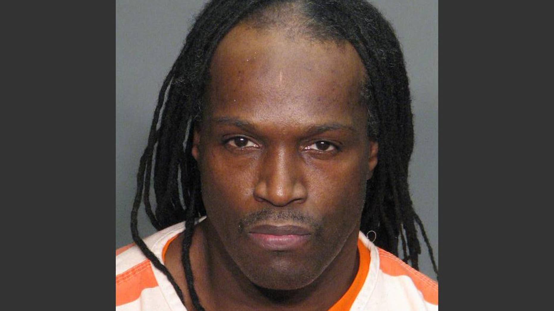 FILE - In this undated file photo provided by Raleigh/Wake City-County Bureau of Identification, Kelvin Melton is shown. A North Carolina prosecutor was the intended target of an elaborate kidnapping plot, but the kidnappers looked up the wrong address on the Internet and abducted the prosecutor's father instead, according to an indictment released Tuesday, April 22, 2014. Authorities have said the kidnapping was retaliation for Colleen Janssen's prosecution of Melton for his involvement in a 2011 shooting. Melton, a high-ranking member of the Bloods gang, orchestrated the abduction from behind bars using a cellphone, the indictment said. (AP Photo/Raleigh/Wake City-County Bureau of Identification, File)