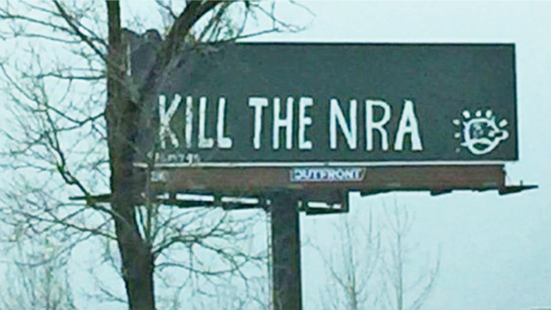This vandalized billboard has popped up in Louisville, Ky., in the wake of last week's Florida high school shooting.
