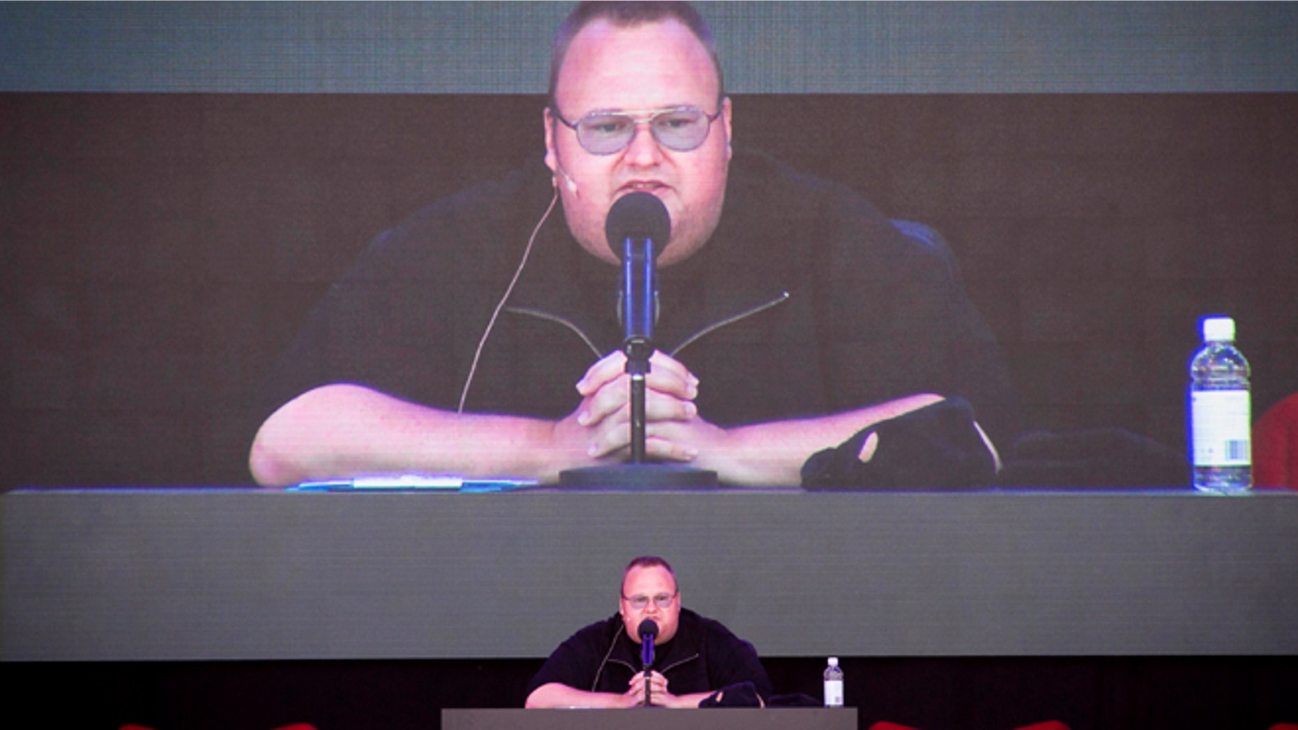 Jan. 20, 2013: Megaupload founder Kim Dotcom practices a speech before the launch of his new file-sharing website, called "Mega," at his Coatesville mansion in Auckland, New Zealand.