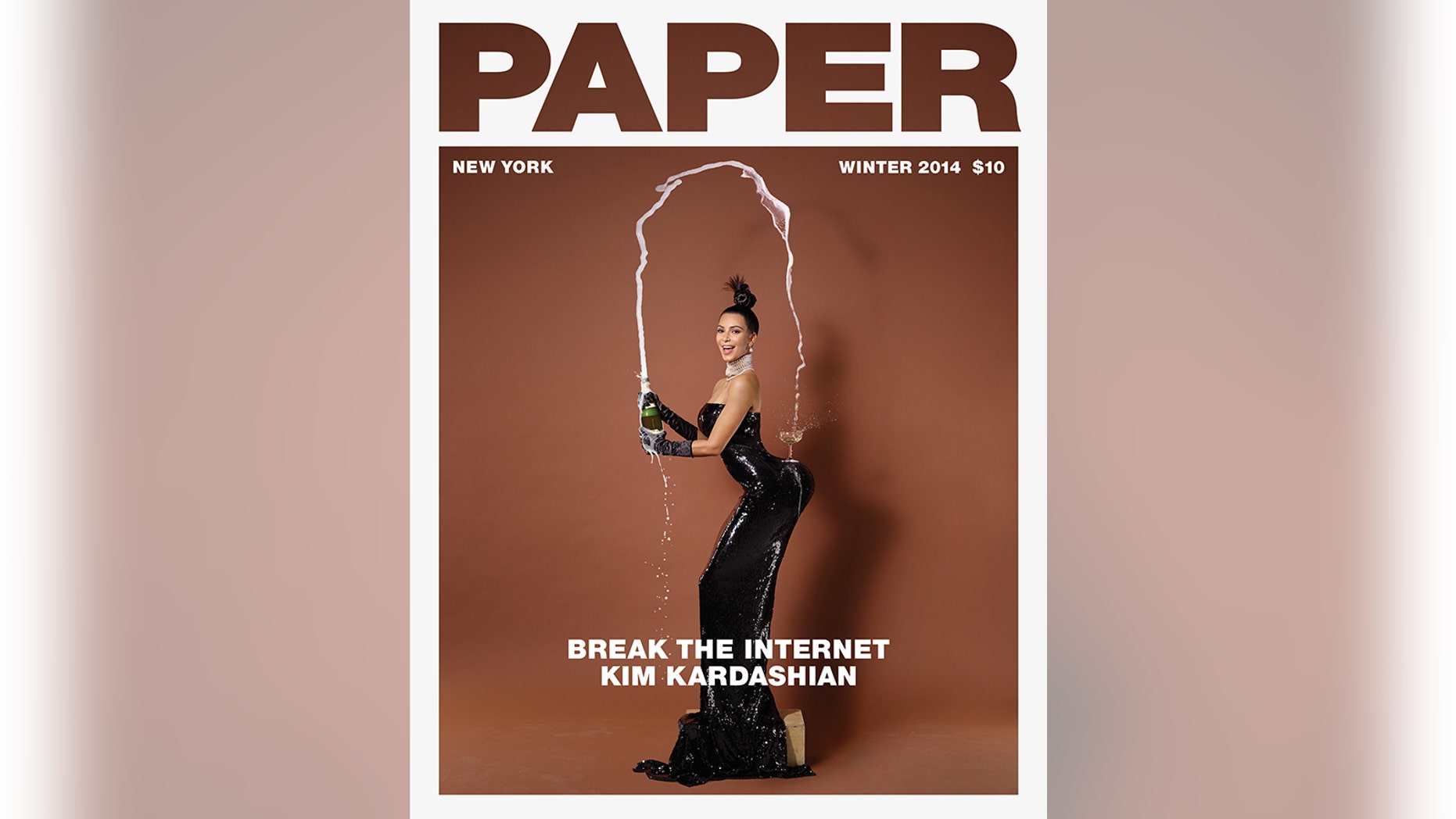 Kim Kardashian appears on the cover of Paper magazine.