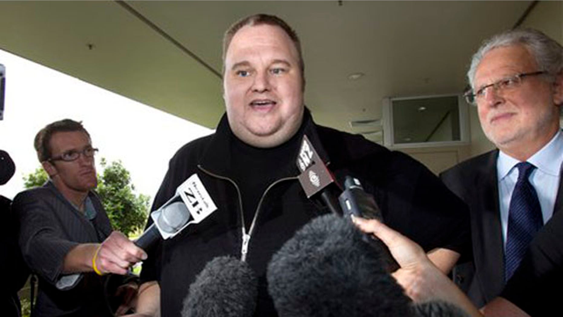 Feb. 22, 2012: In this file photo, Kim Dotcom, the founder of the file-sharing website Megaupload, comments after he was granted bail and released in Auckland, New Zealand.
