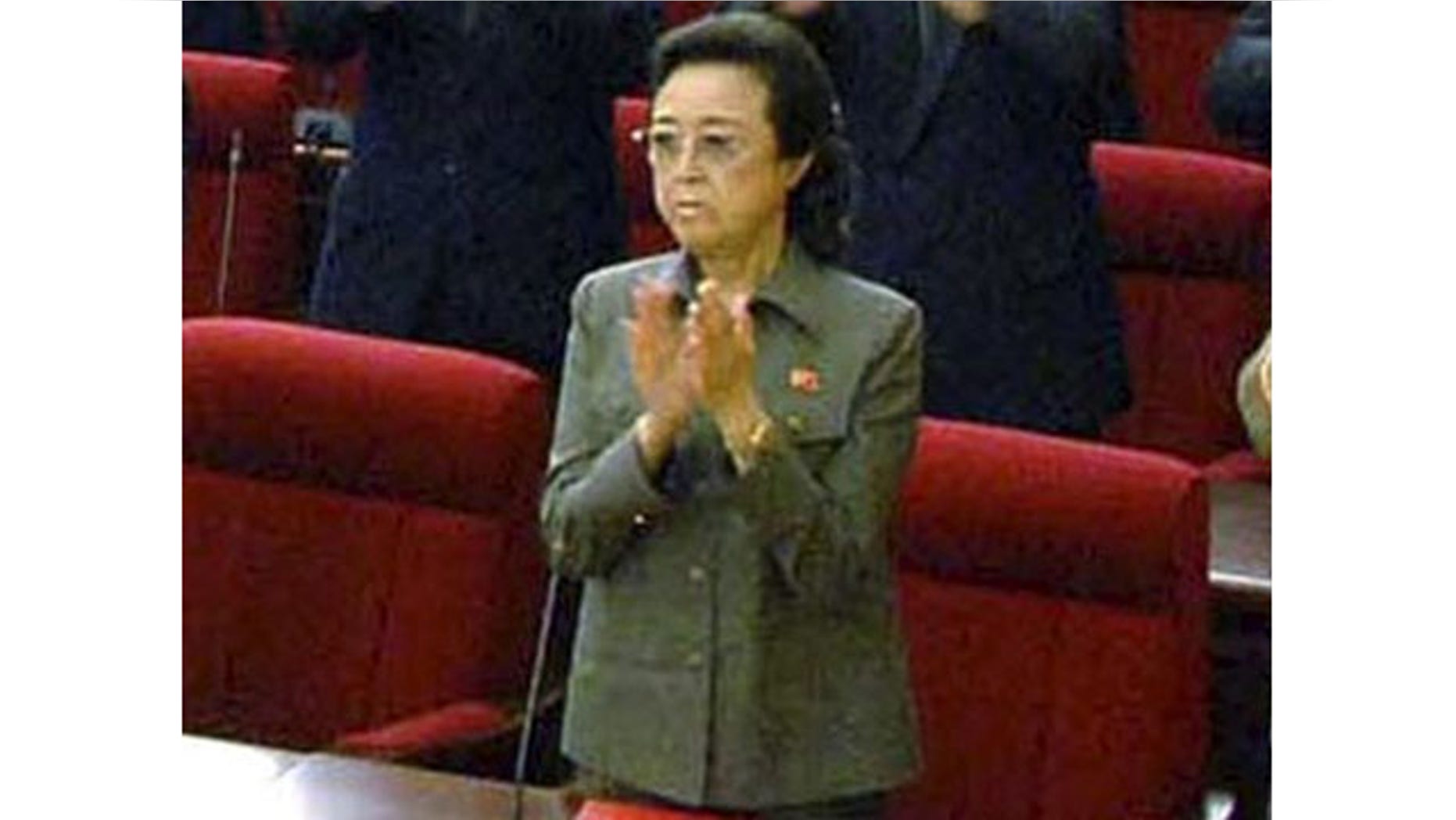 FILE - In this Sept. 28, 2010 file photo released by Korean Central News Agency via Korea News Service, Kim Kyong Hui, front row center, the aunt of North Korean leader Kim Jong Un, claps hands with other delegates during the ruling Workers' Party representatives meeting in Pyongyang, North Korea. (AP/KCNA/KNS)
