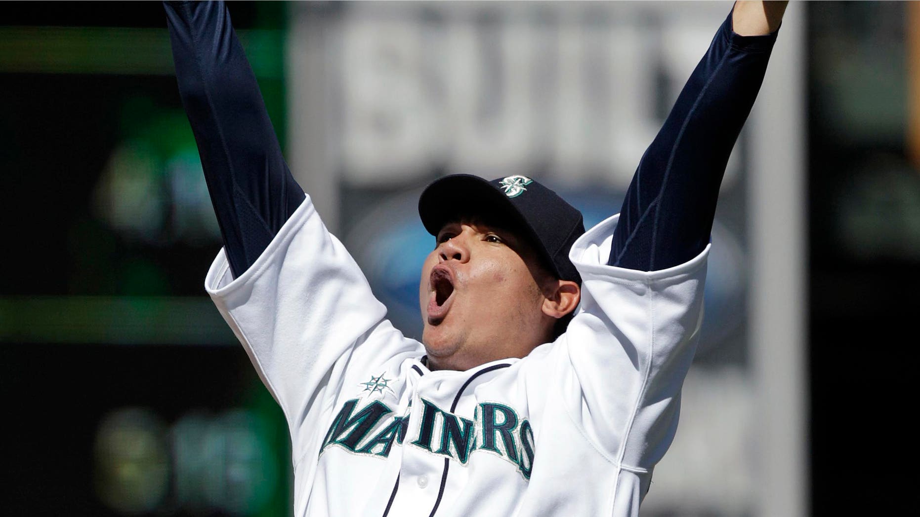 In this Aug. 15, 2012, file photo, Seattle Mariners pitcher Felix Hernandez reacts after throwing a perfect game against the Tampa Bay Rays in Seattle.