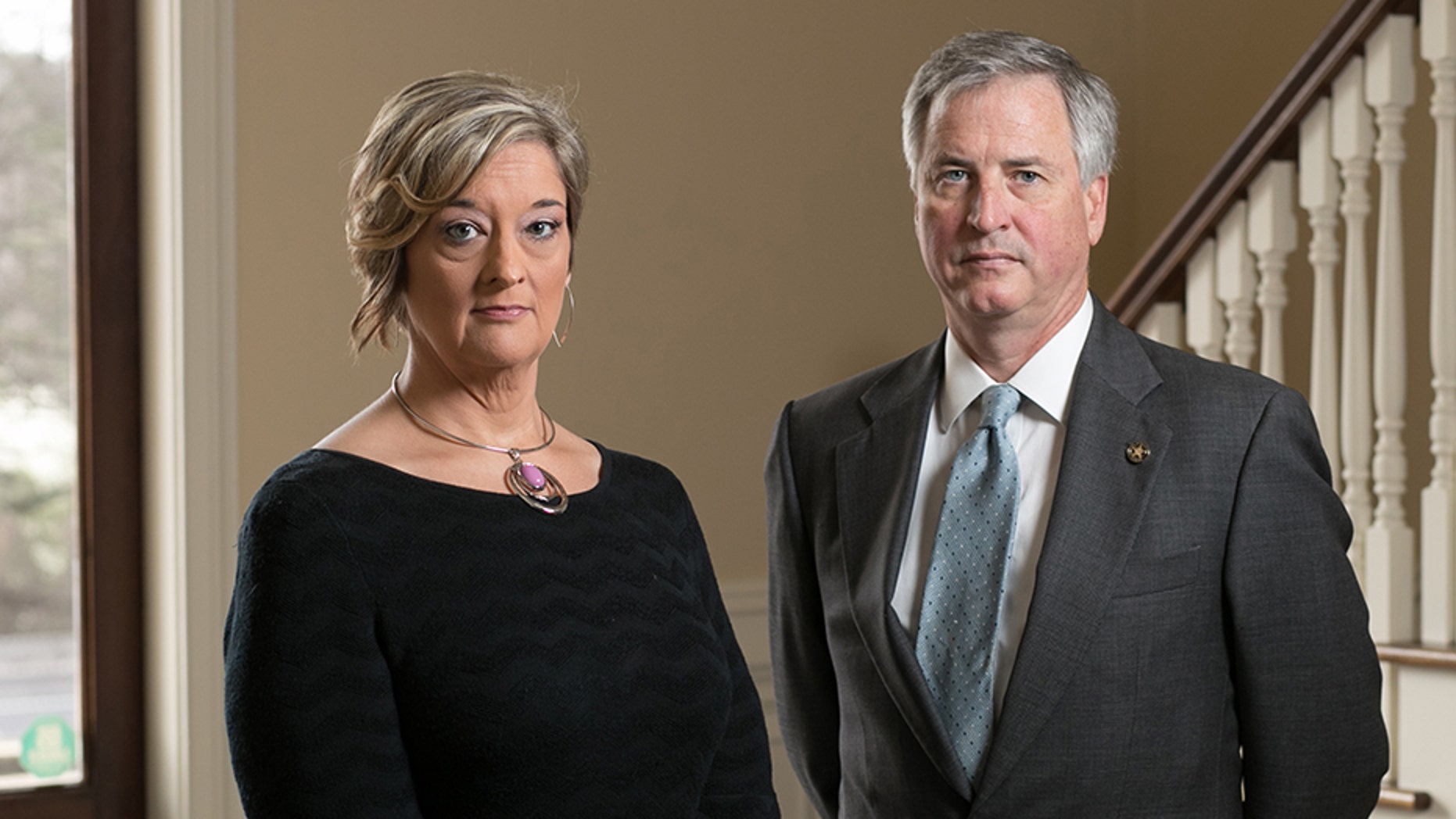Anne King, of Tennille, Ga., is shown with her lawyer Ken Hodges at Hodges' law office Thursday, March 1, 2018, in Atlanta. King is suing her ex-husband.