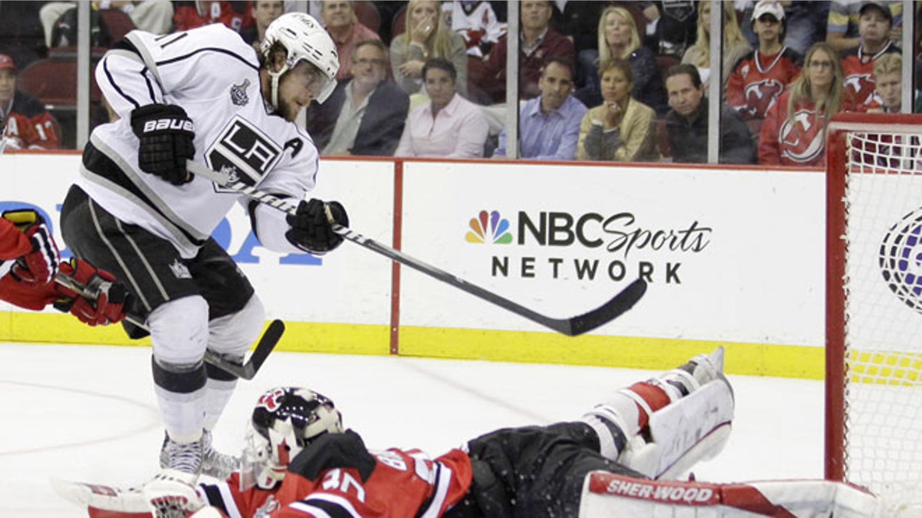May 30, 2012: Los Angeles Kings' Anze Kopitar, of Slovenia, scores past New Jersey Devils' Martin Brodeur during overtime in Game 1 of the NHL hockey Stanley Cup finals in Newark, N.J. The Kings won 2-1.