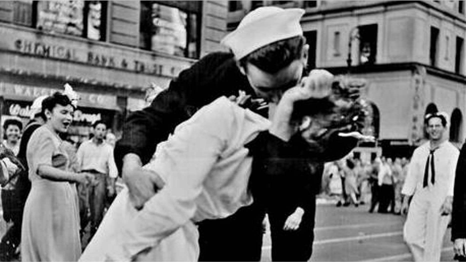 August 14, 1945: An American sailor kisses a nurse to celebrate the end of World War II. The nurse, Edith Shain, died June 23, 2010, at age 91.