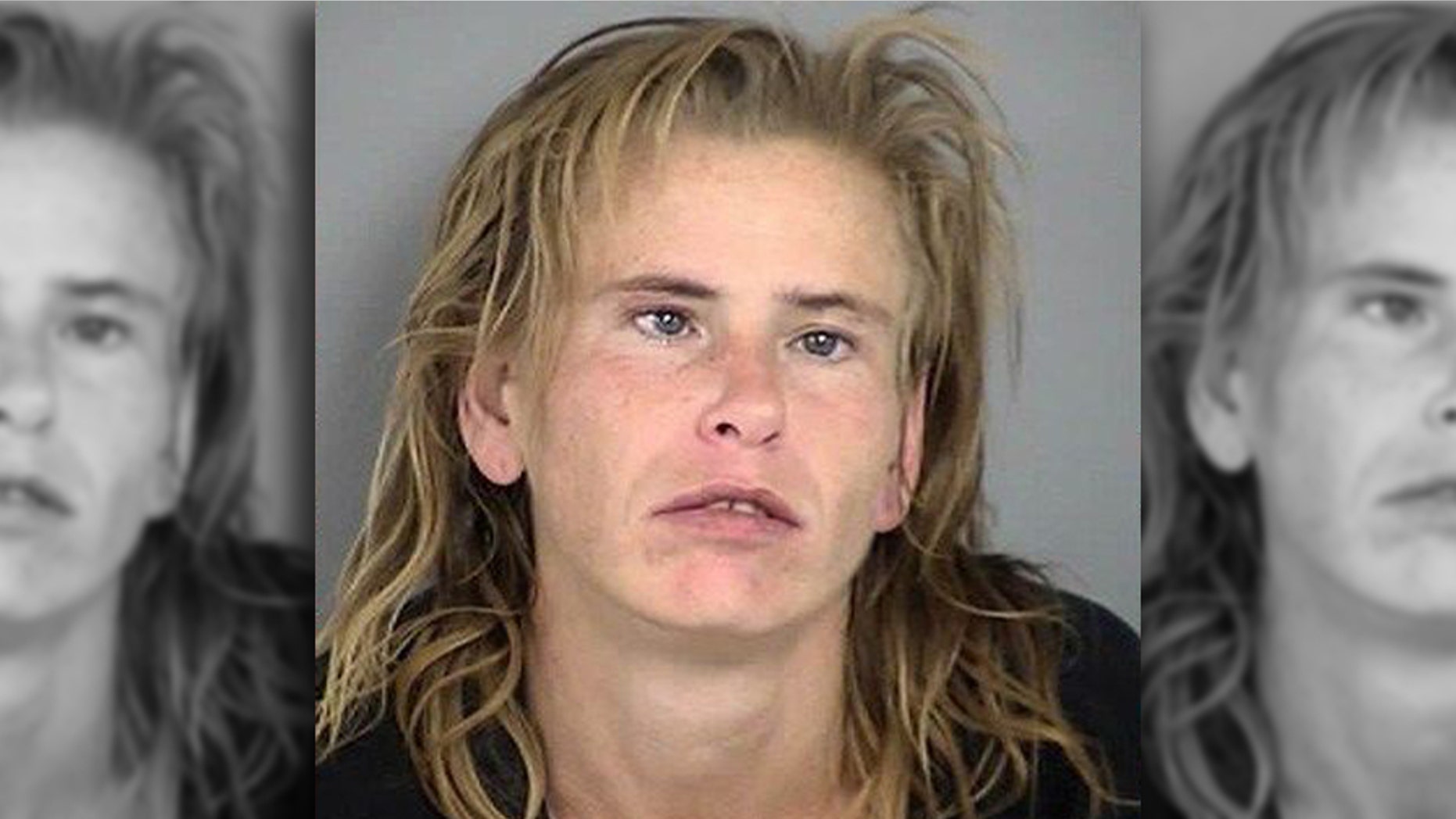 Kisstal Killough, 33, was arrested Tuesday after she allegedly tried to climb an elementary school playground fence while holding a pickaxe and shouting threats.