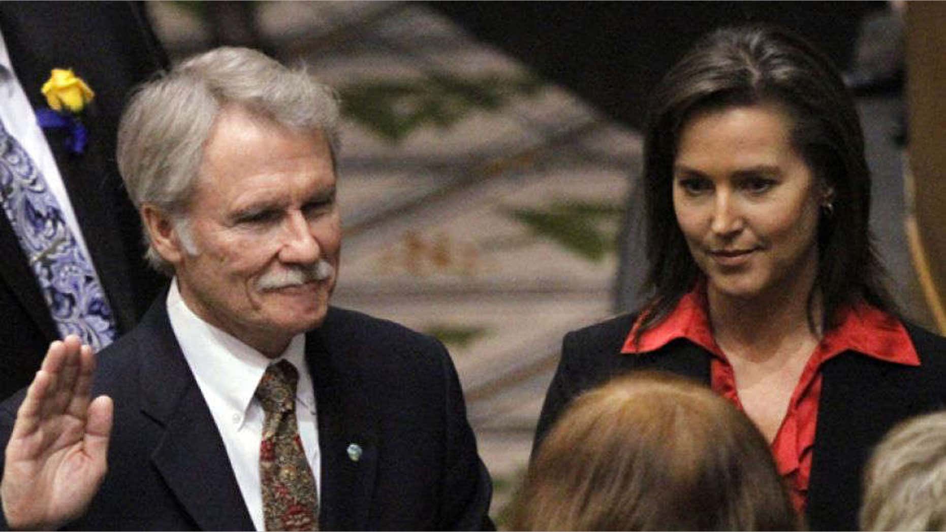 Jan. 10, 2011: Oregon Gov. John Kitzhaber, Democrat, is sworn in with financee Cylvia Hayes at his side. Salem, Oregon.
