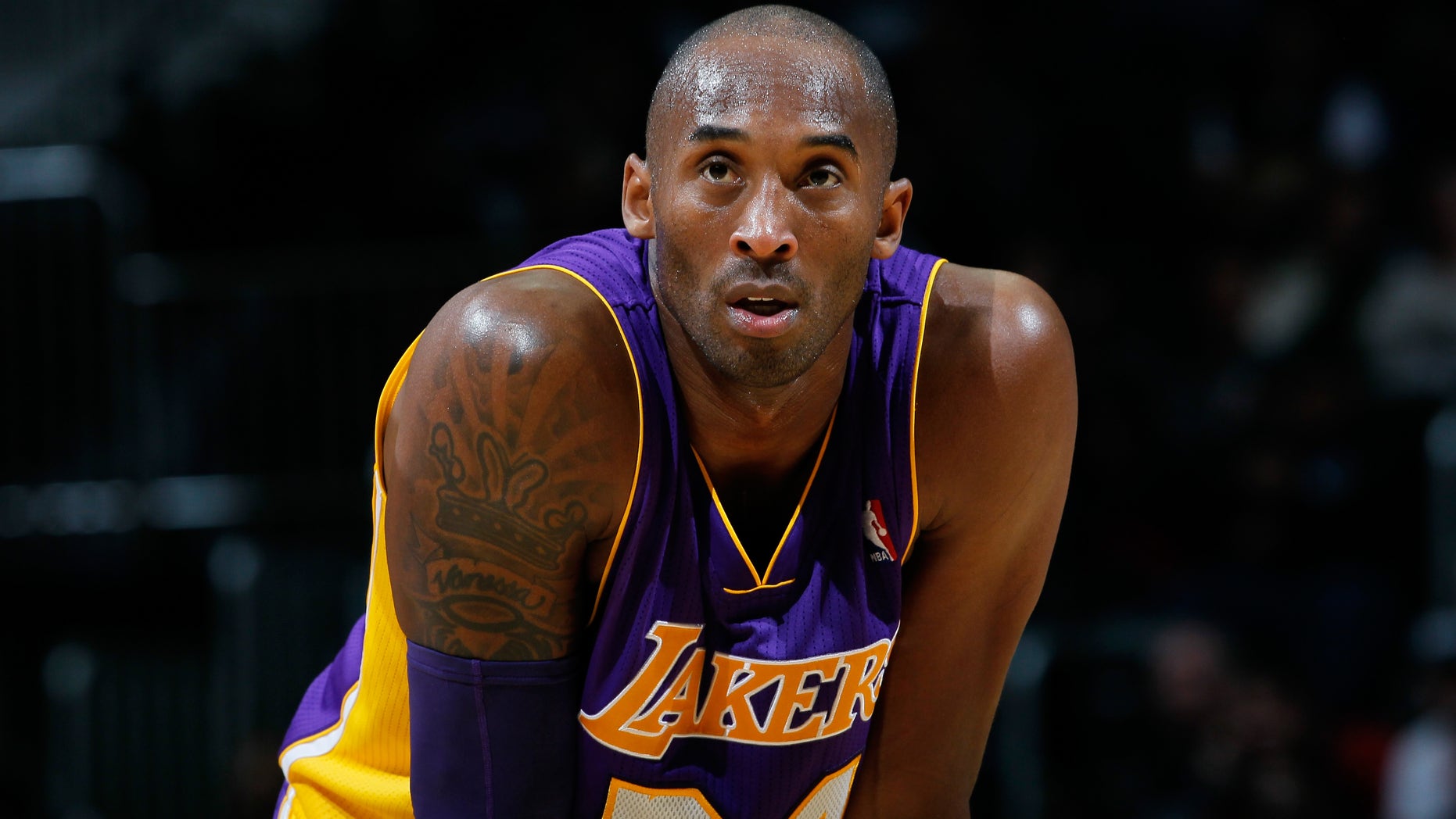 ATLANTA, GA - DECEMBER 16: Kobe Bryant #24 of the Los Angeles Lakers stands during a free throw against the Atlanta Hawks at Philips Arena on December 16, 2013 in Atlanta, Georgia. NOTE TO USER: User expressly acknowledges and agrees that, by downloading and or using this photograph, User is consenting to the terms and conditions of the Getty Images License Agreement. (Photo by Kevin C. Cox/Getty Images)
