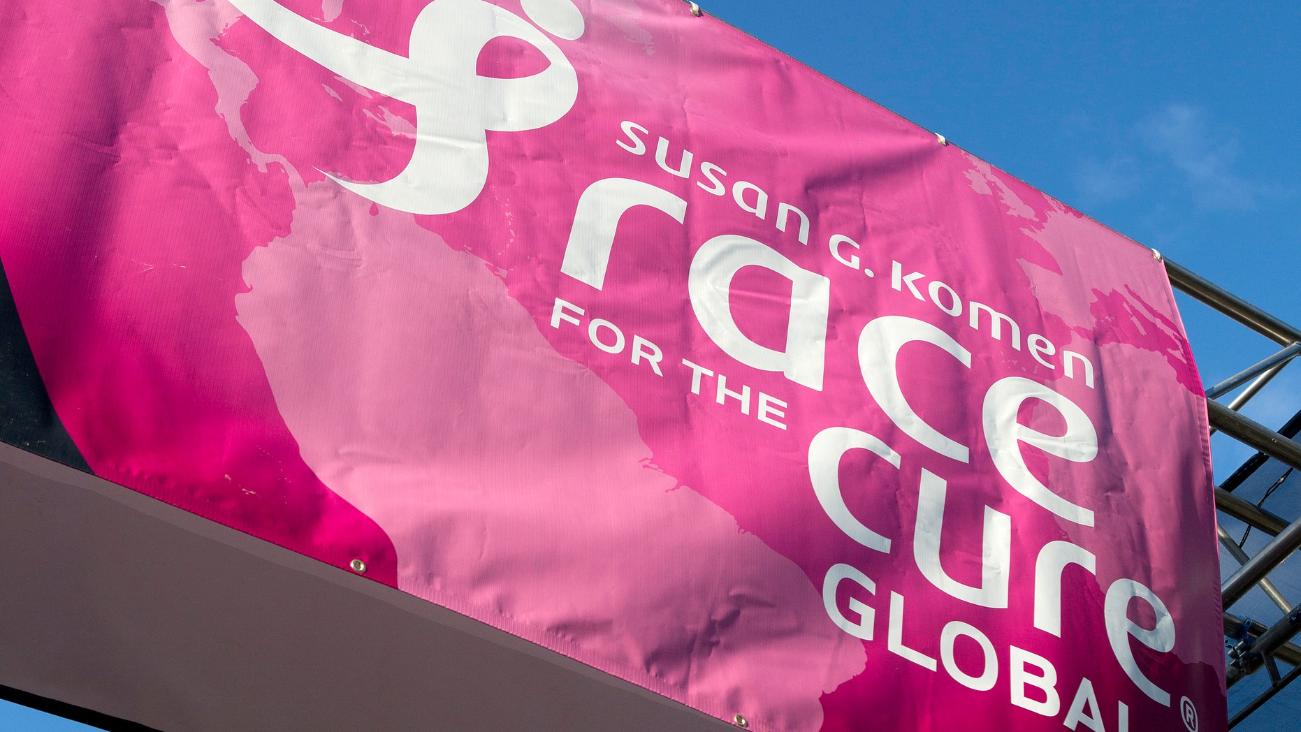 A sign for the Susan G. Komen Foundation's 2012 Race for the Cure is displayed in Washington.