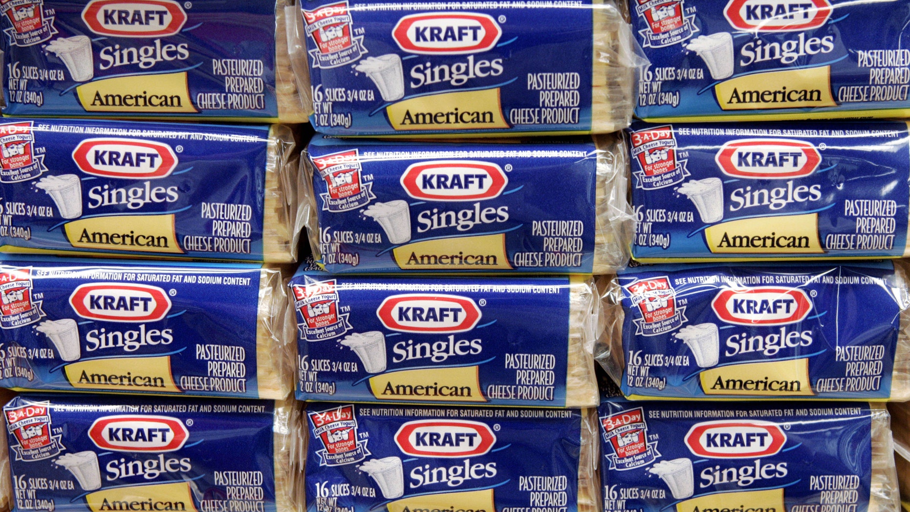 Packages of Kraft Singles are displayed in Chicago. (AP Photo/Charles Rex Arbogast, file)