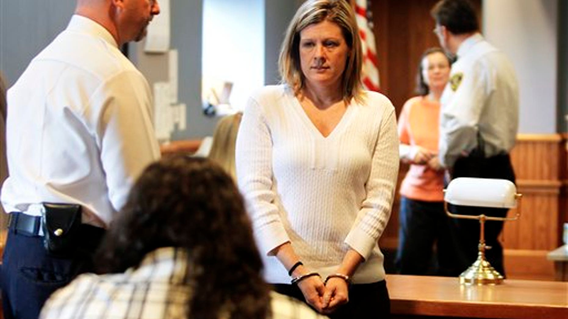 April 12: Kristen LaBrie looks at family and friends after she was found guilty on all four counts, including attempted murder, in the death of her son, at Lawrence Superior Court in Lawrence, Massachusetts.