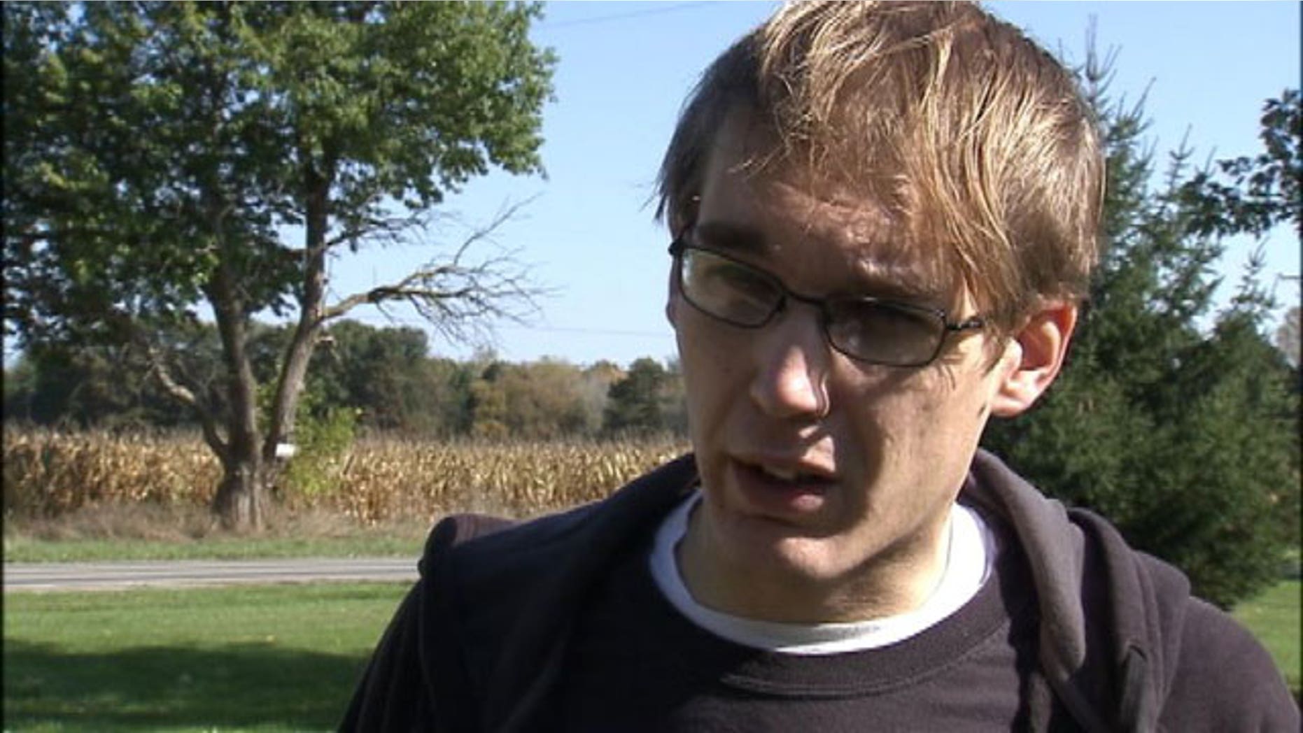 This undated photo shows Kristopher Oswald who said he was fired after helping a woman being attacked in a Walmart parking lot.
