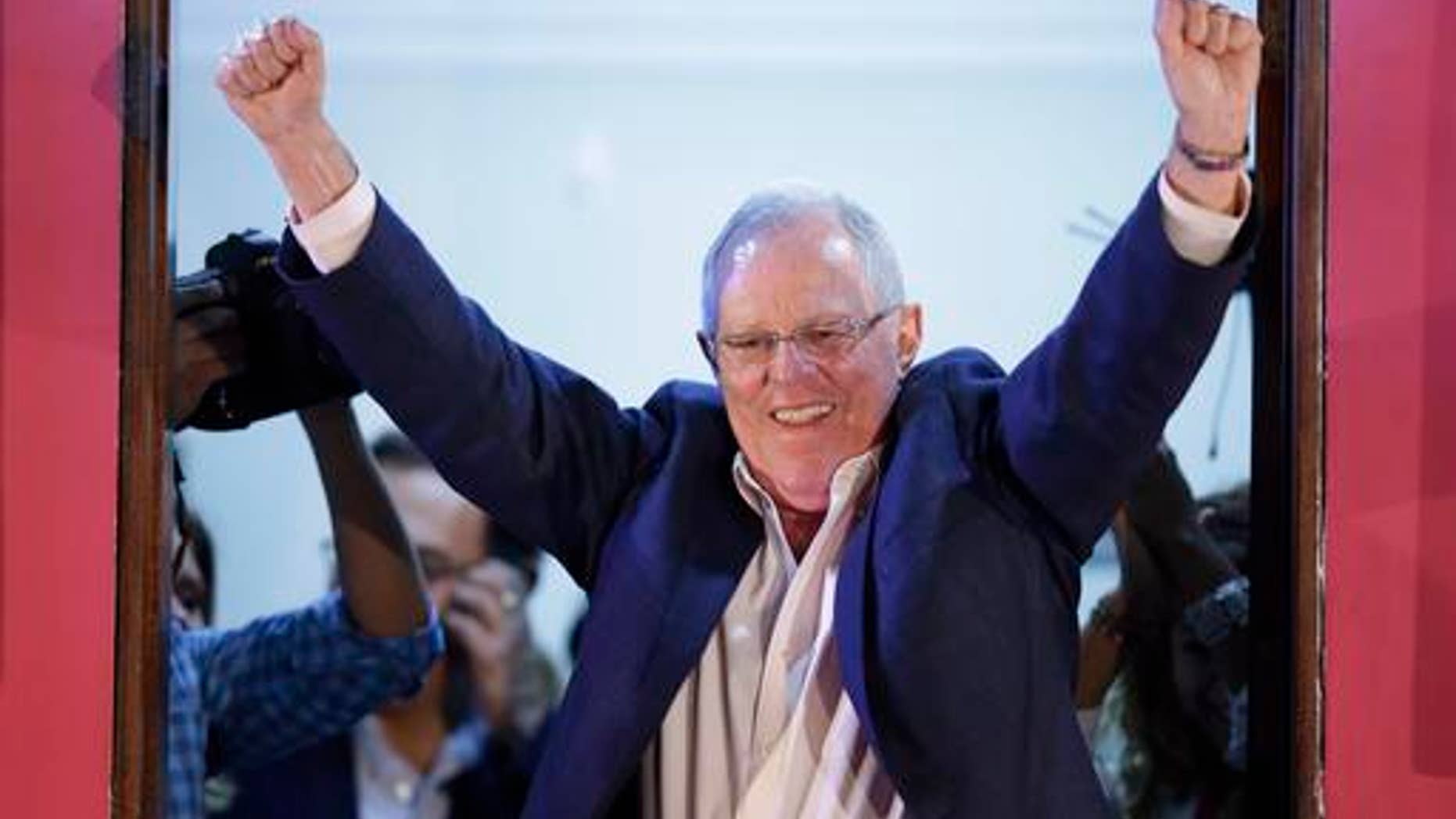 Presidential candidate Pedro Pablo Kuczynski celebrates in Lima, Peru, Sunday, June 5, 2016.