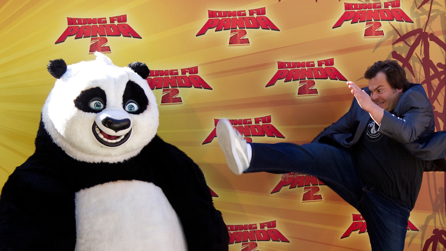 Jack Black poses with "Kung Fu Panda"