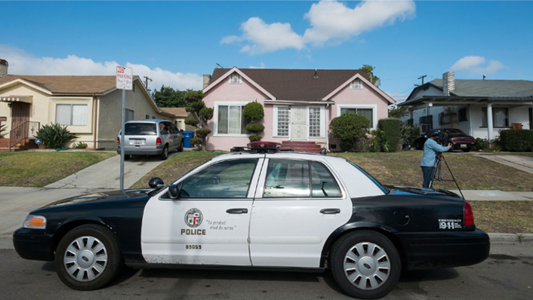 LOS ANGELES, CA - MAY 20: A police car sits parked in fromt of Michael Jace's home on May 20, 2014 in Los Angeles, California. The actor has been arrested for the murder of his wife . (Photo by Valerie Macon/Getty Images)
