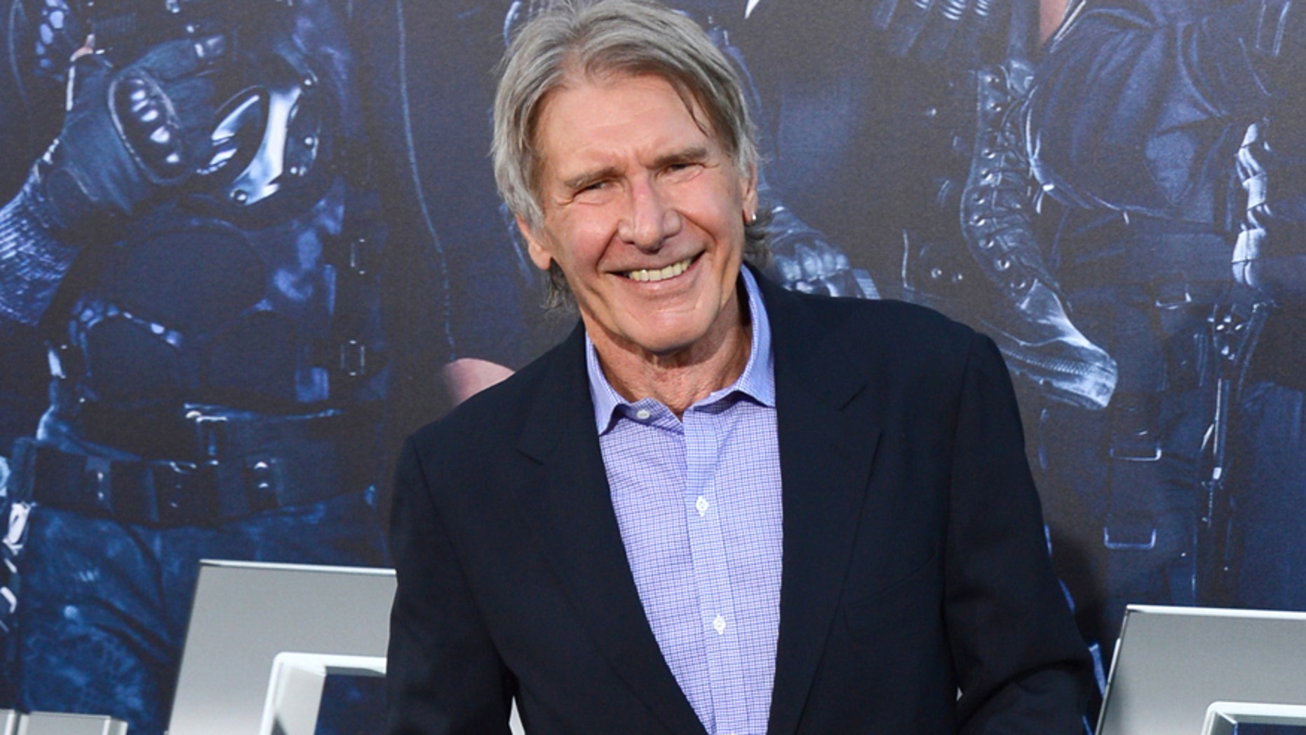 FILE - In this Aug. 11, 2014 file photo, Harrison Ford arrives at the premiere of "The Expendables 3" at TCL Chinese Theatre in Los Angeles.