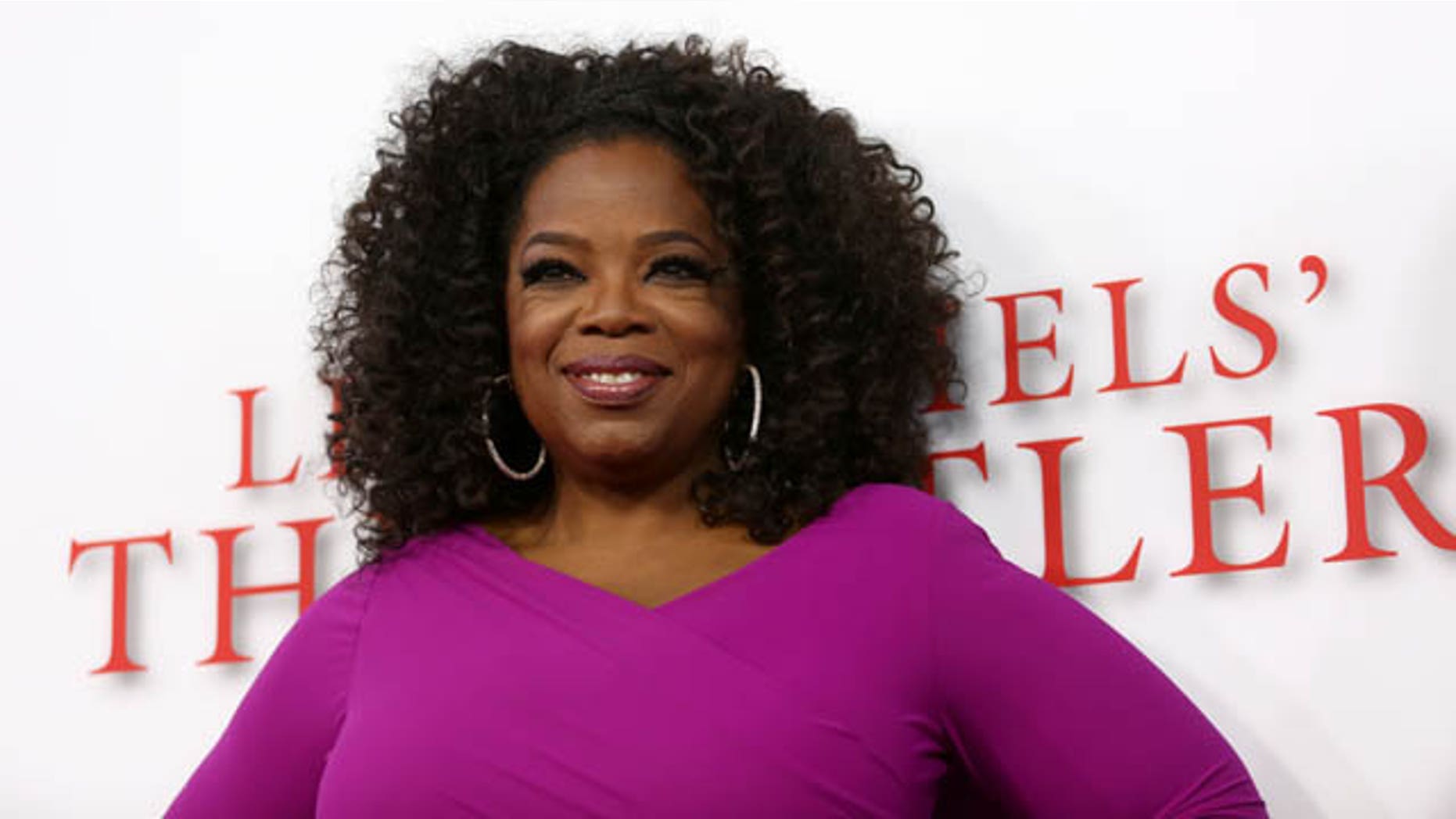 August 12, 2013: Oprah Winfrey arrives at the Los Angeles premiere of "Lee Daniels' The Butler" at the Regal Cinemas L.A. Live Stadium 14. (Photo by Matt Sayles)